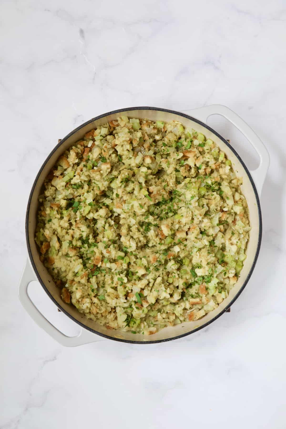 Finished stuffing in white enamel cast iron skillet.