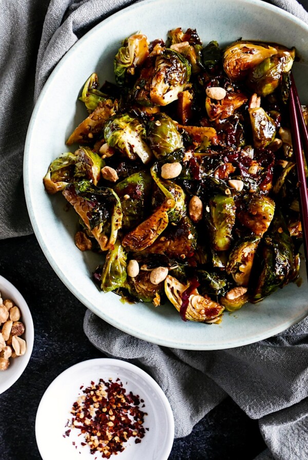 Kung Pao Brussels Sprouts in round white serving bowl.