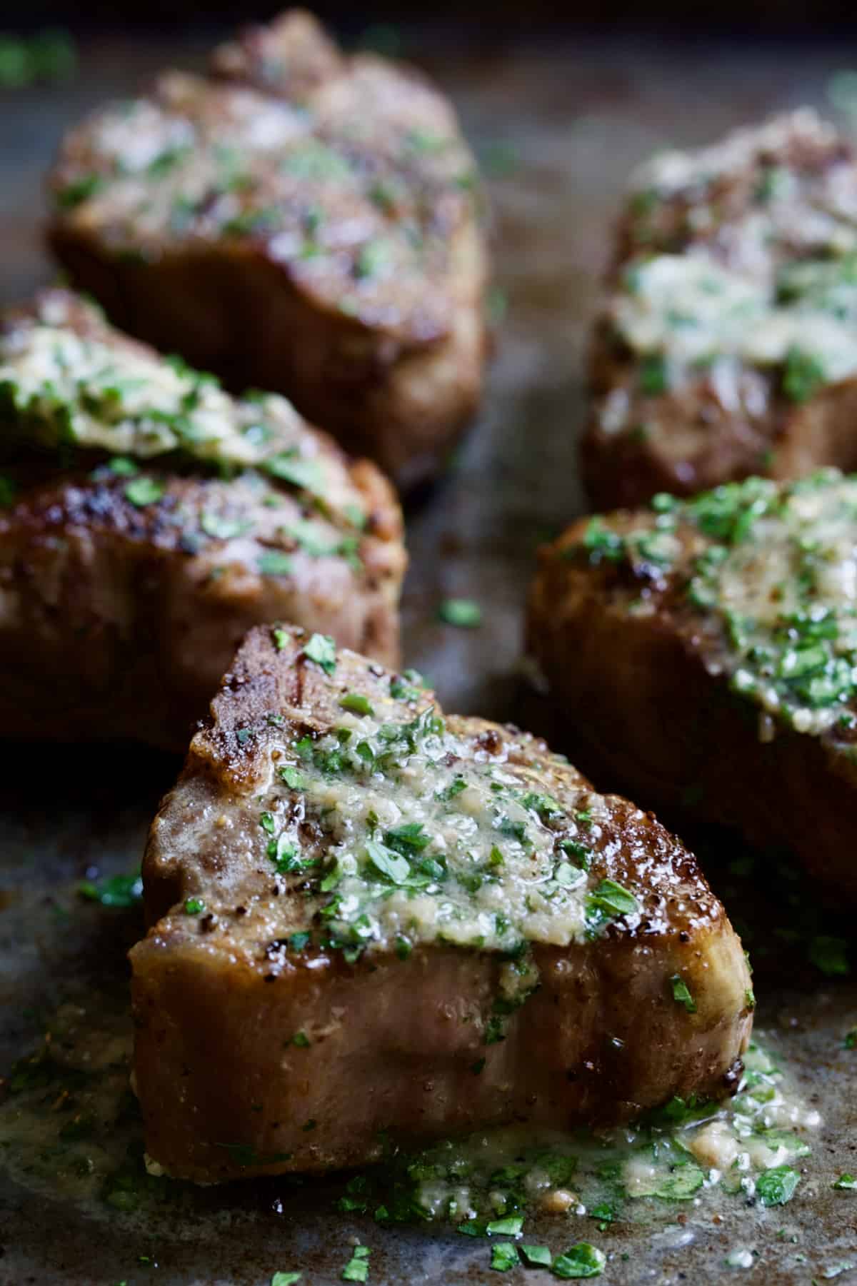 Photo of a Seared Lamb Chop with Anchovy Butter.
