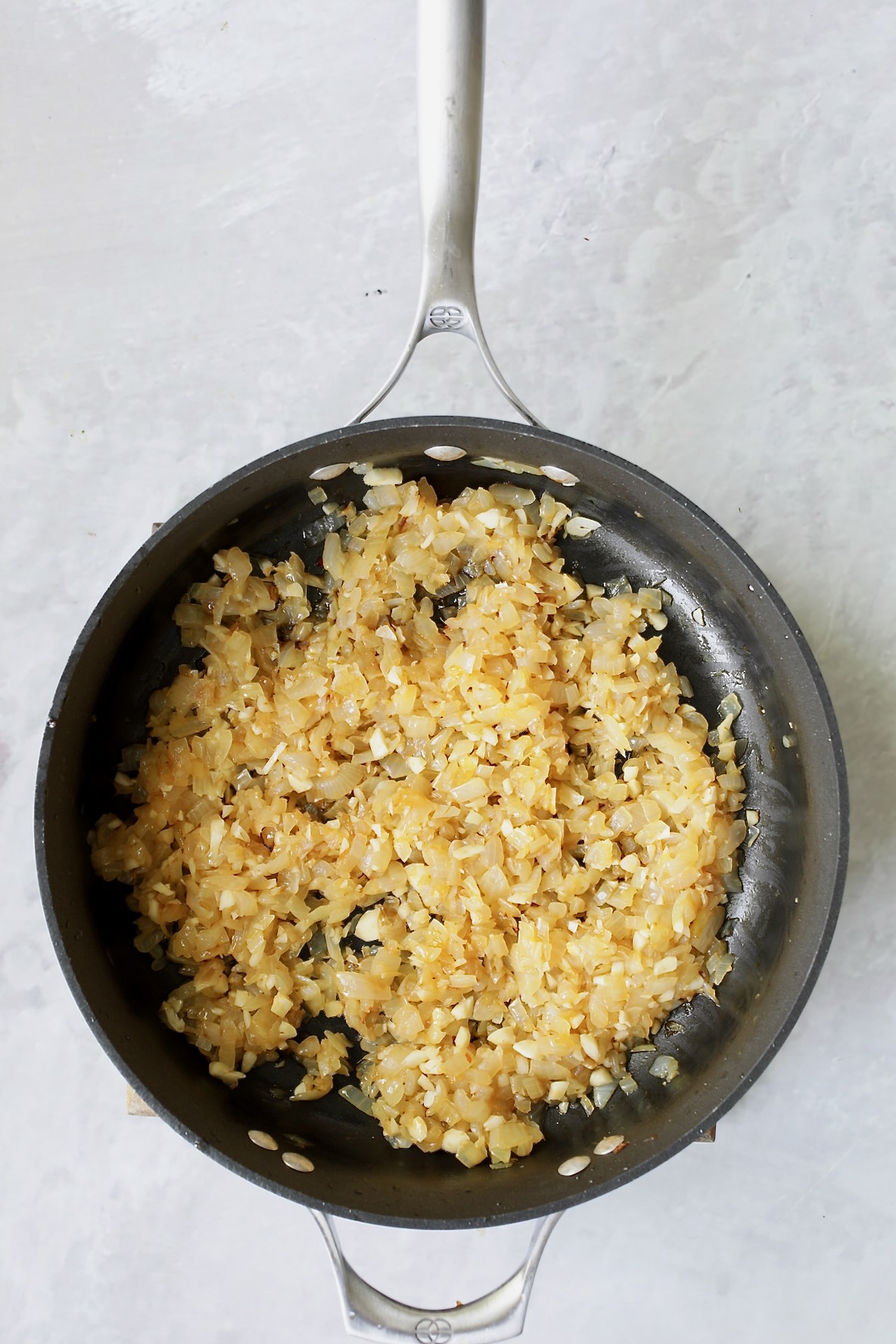 Cooked onions in nonstick skillet.