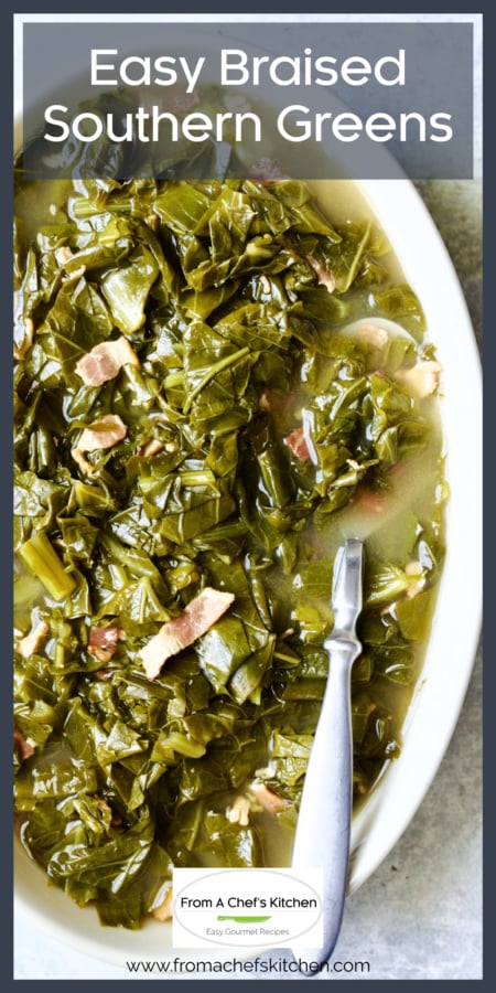 Easy Braised Southern Greens in white oval serving bowl with serving spoon.