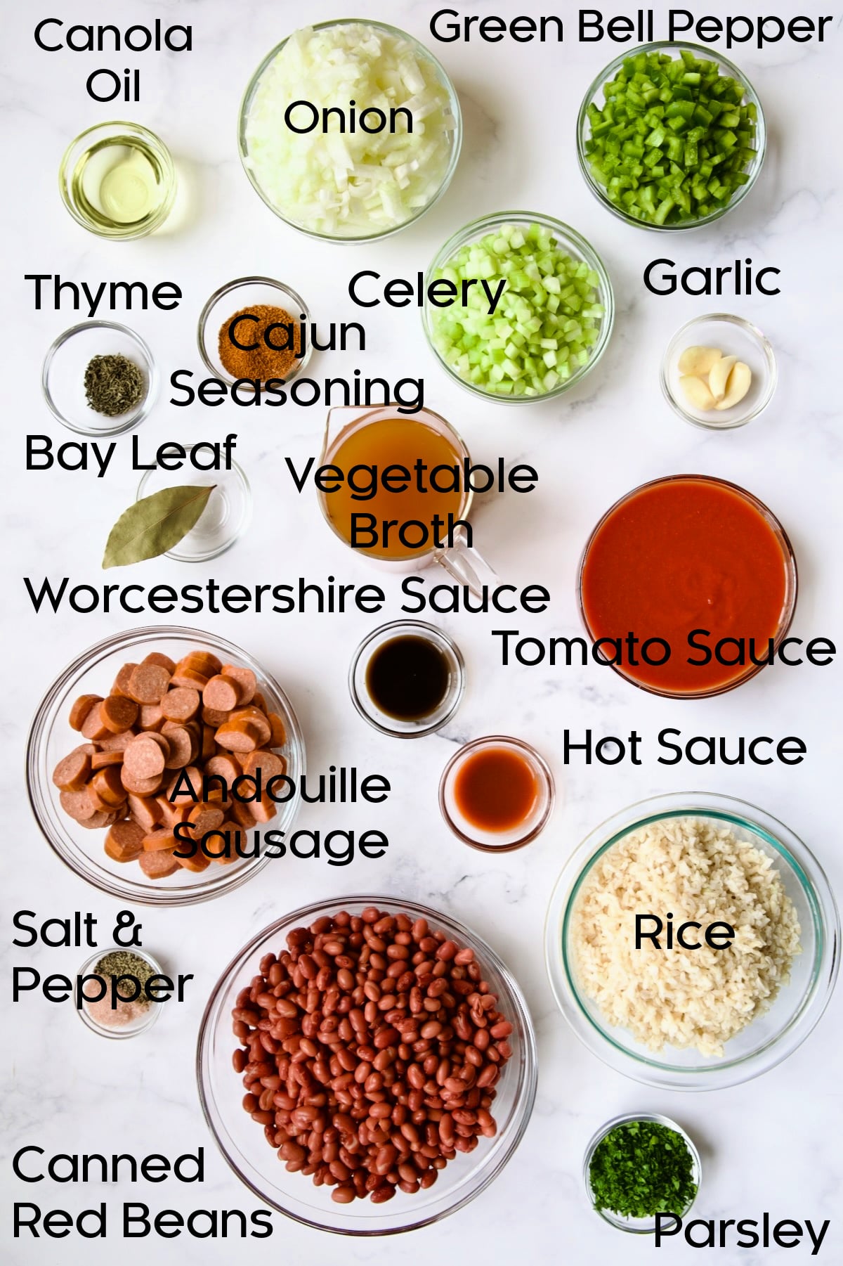 Ingredients for Easy Red Beans and Rice in glass bowls.