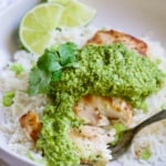 Piece of Mahi-Mahi with Cilantro - Ginger Pesto on a fork.