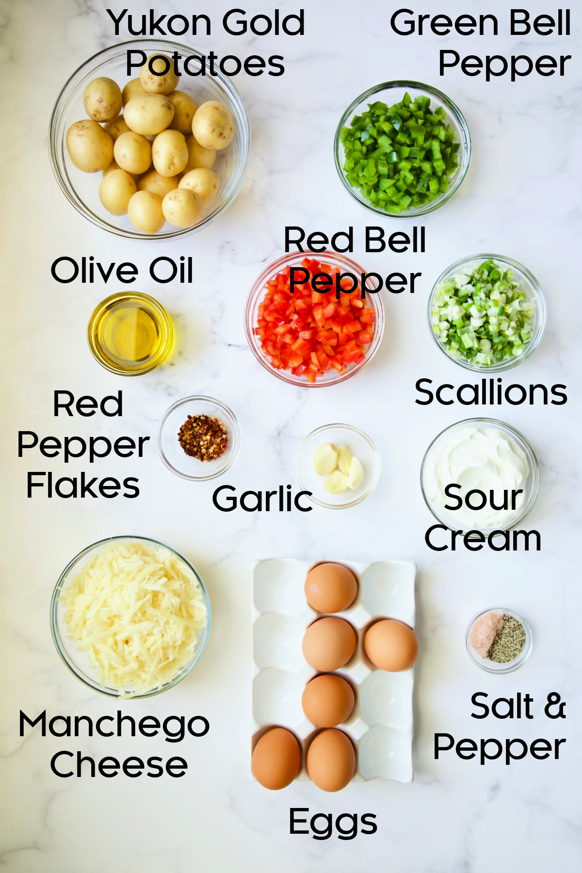 Ingredients for Oven-Baked Spanish Tortilla in glass bowls.