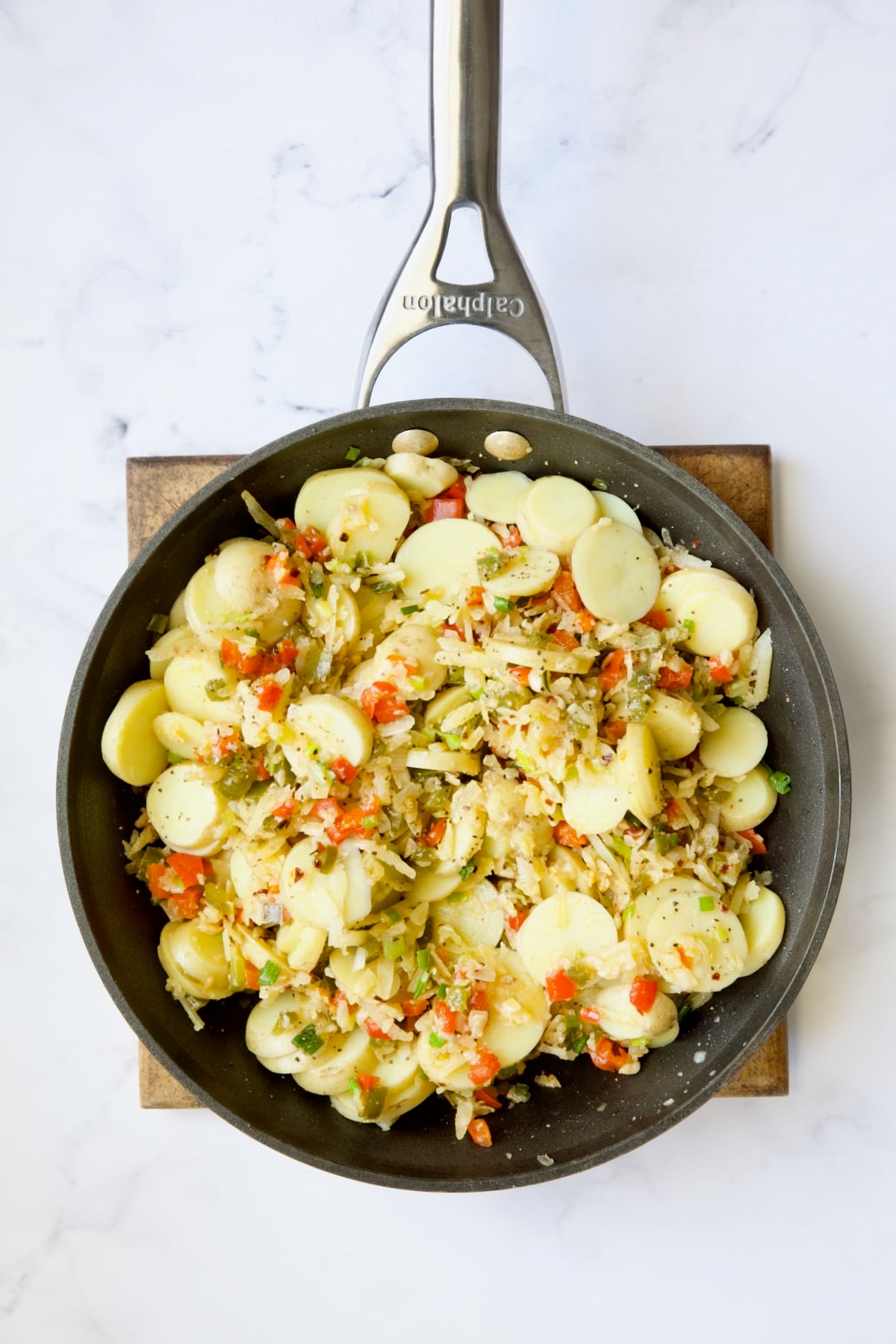 Ingredients for tortilla in nonstick skillet.
