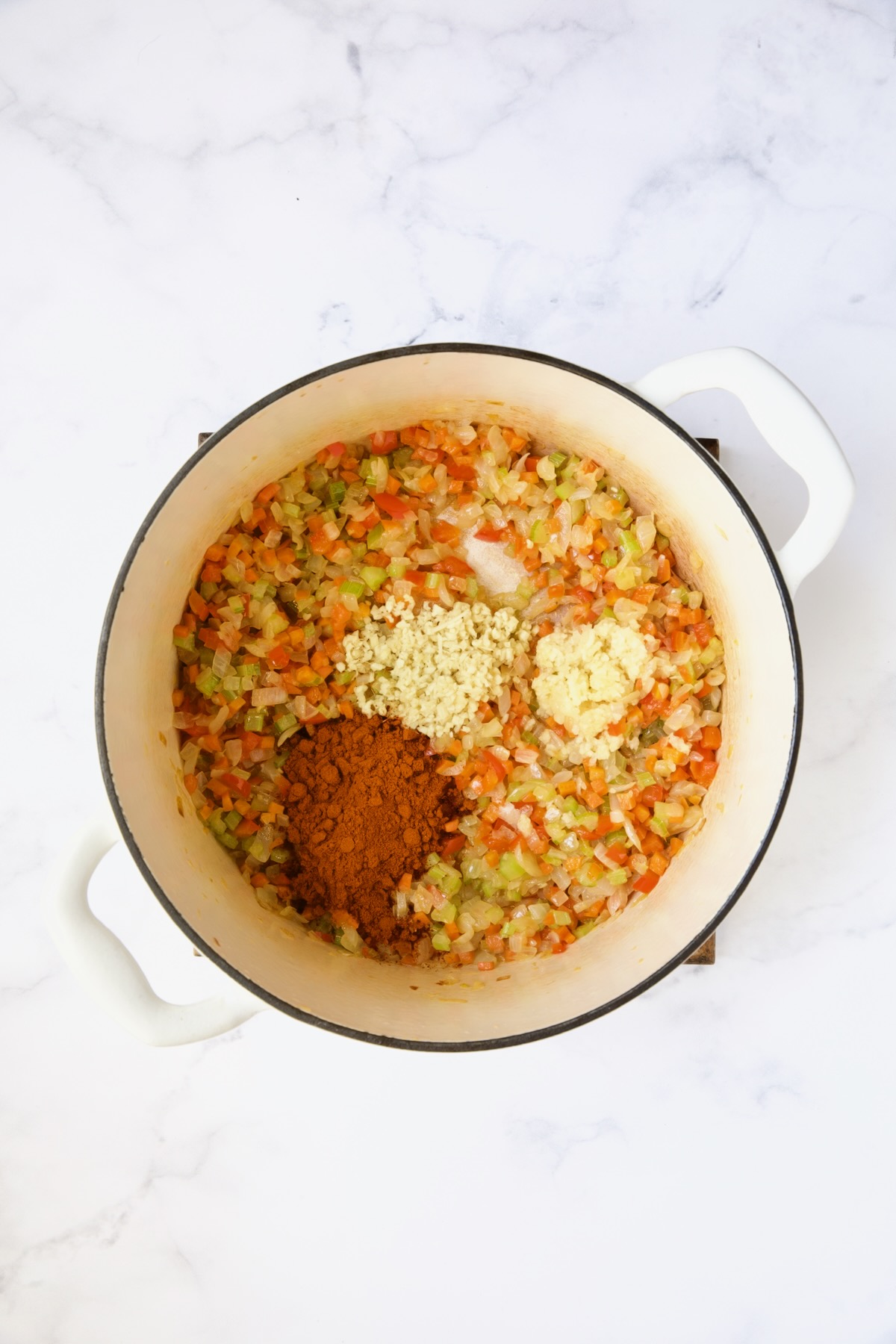 Cooked vegetables with berbere, garlic and ginger yet to be stirred in.
