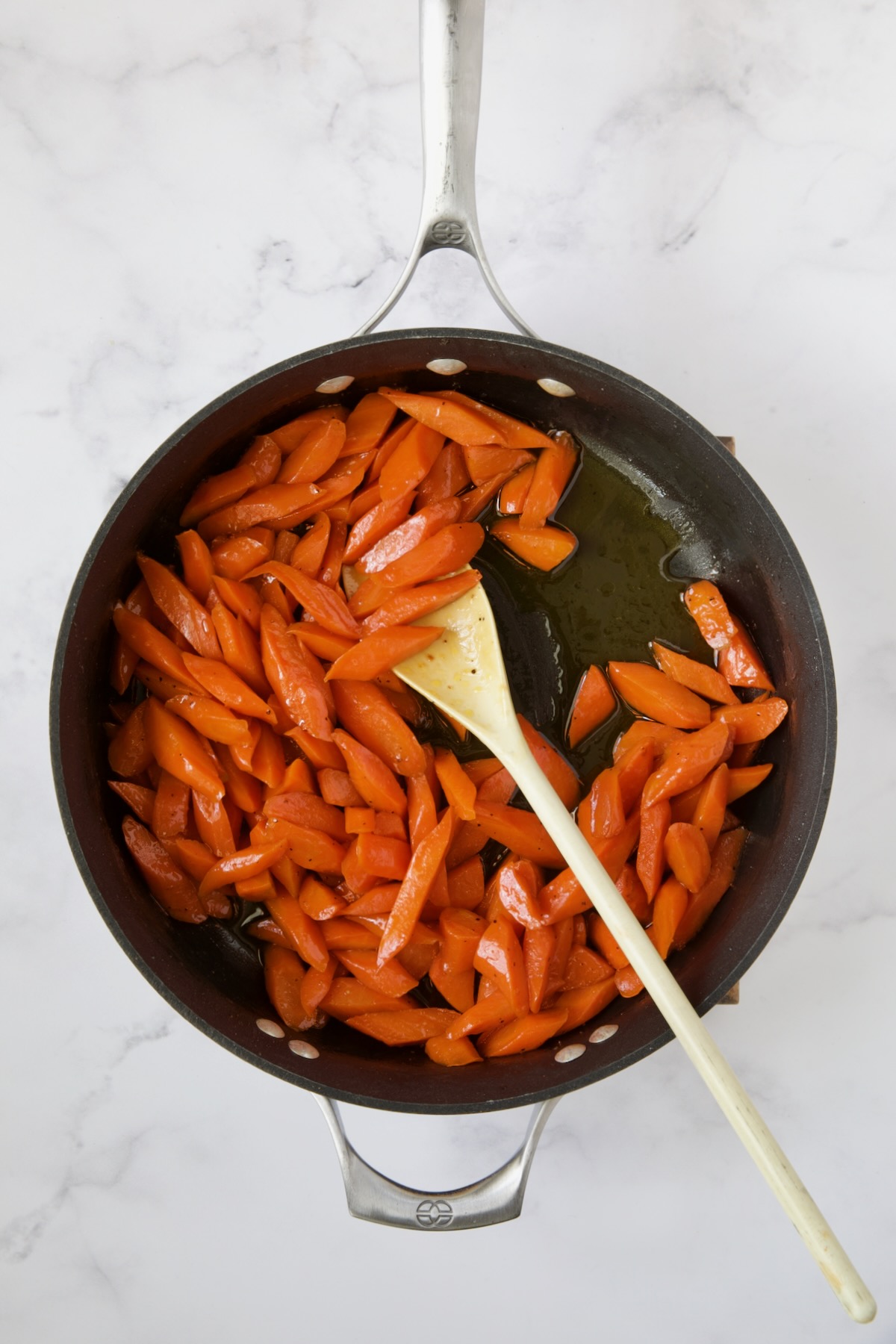 Finished glazed carrots in nonstick skillet.