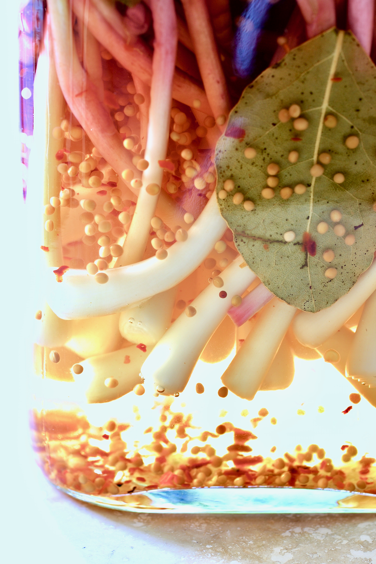 Pickled ramps in glass jar.