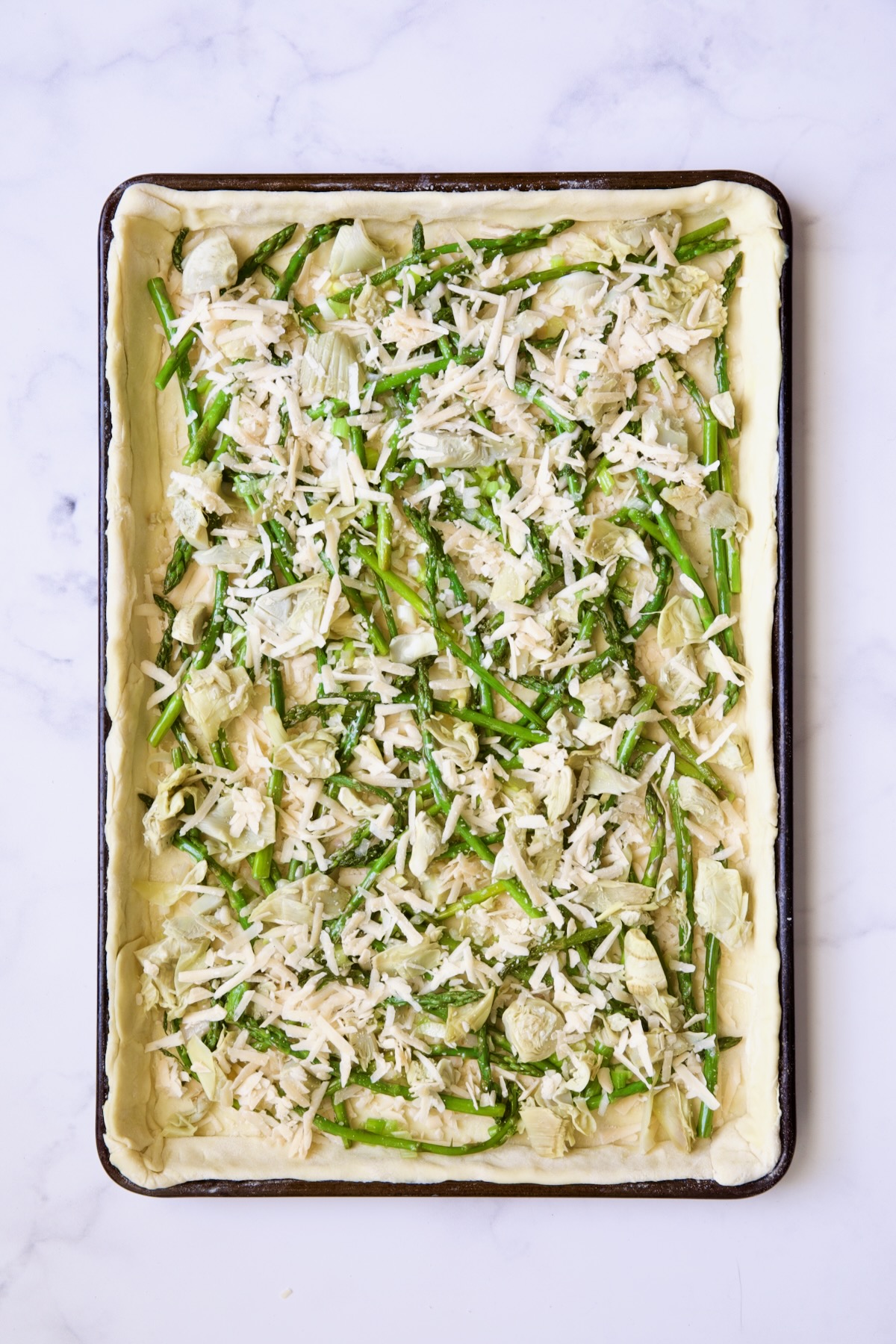 Tart with spring vegetables and cheese added.