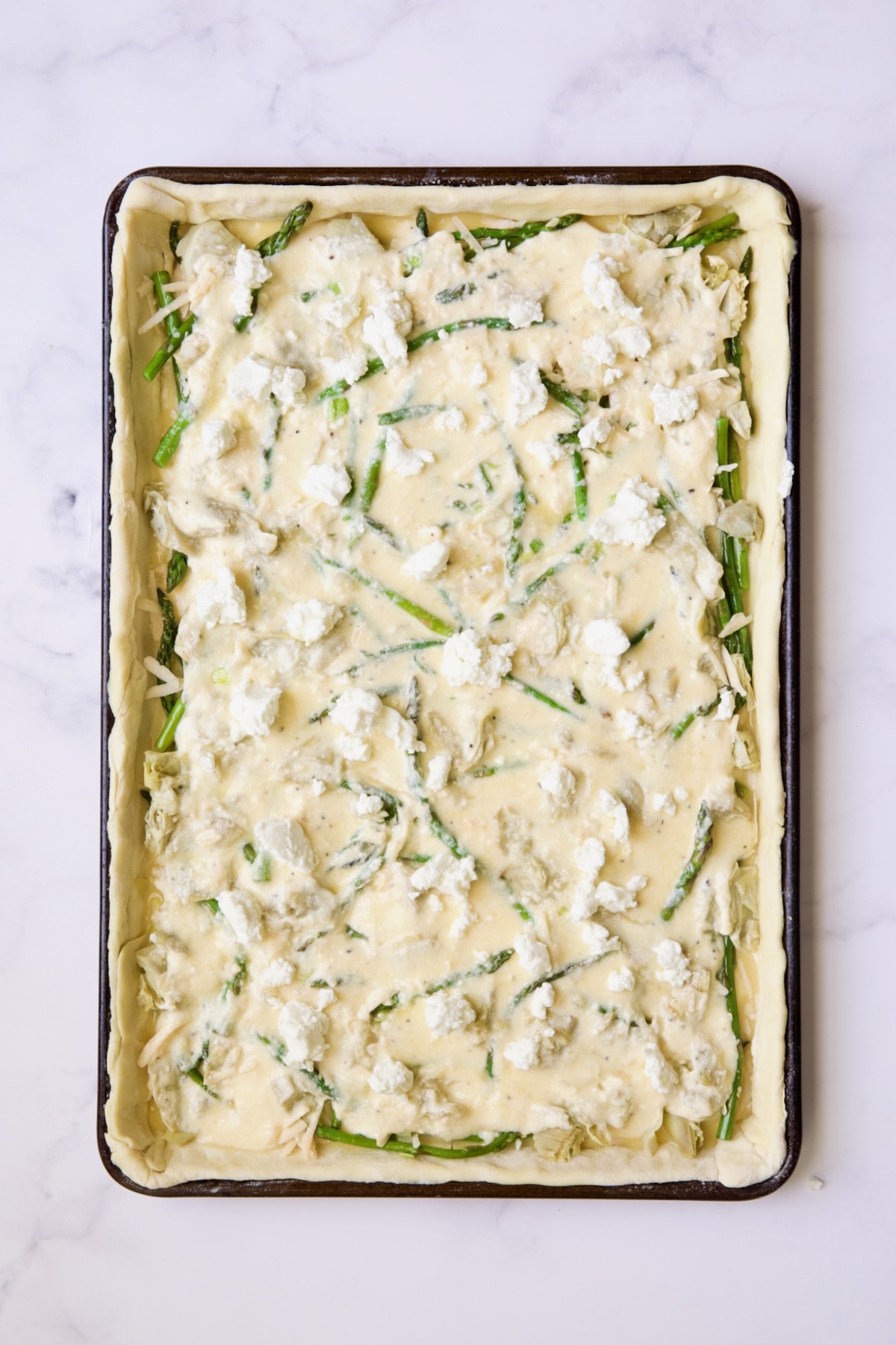 Puff pastry tart before being baked.