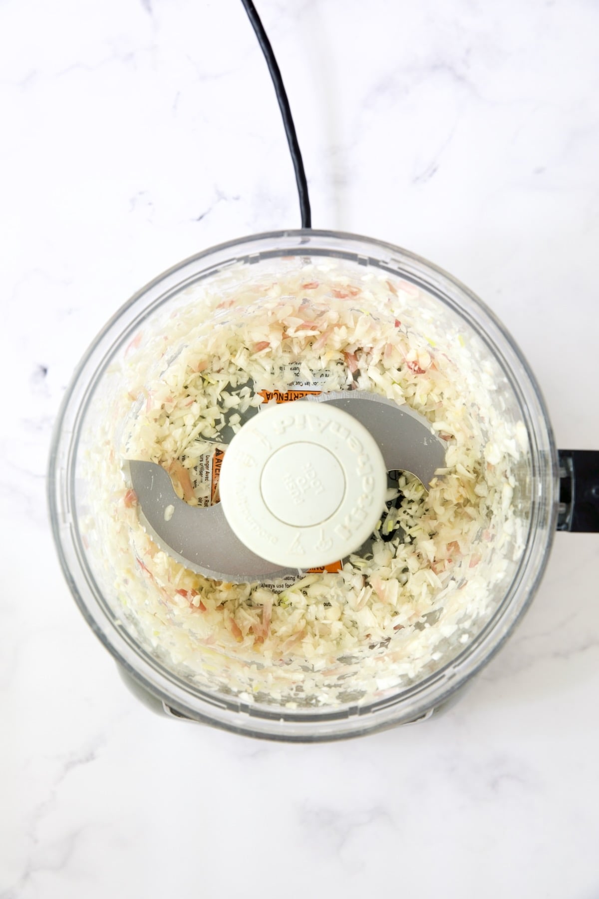 Chopped ramps in food processor.
