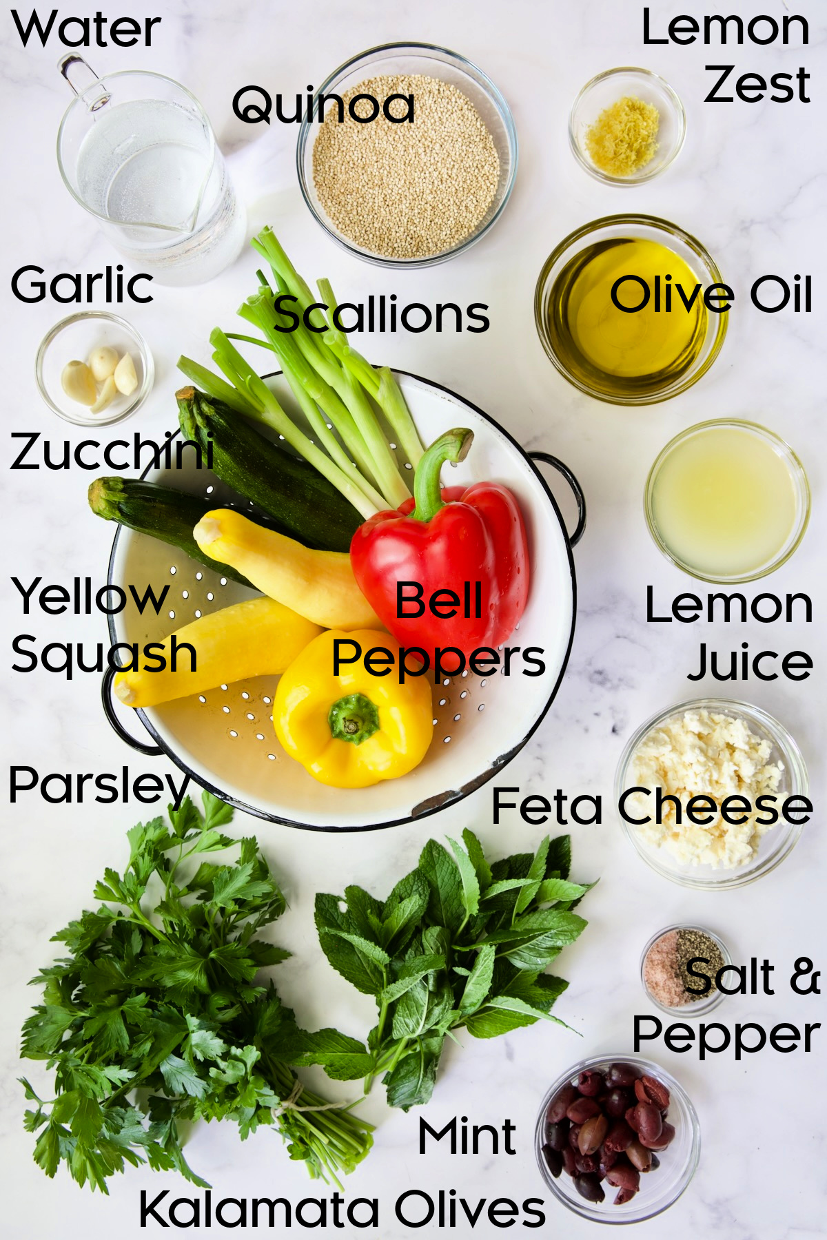 Ingredients for Mediterranean Quinoa Salad with Grilled Vegetables in glass bowl.