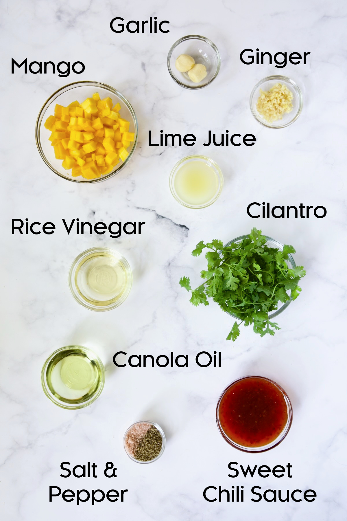 Ingredients for salad in glass bowls.