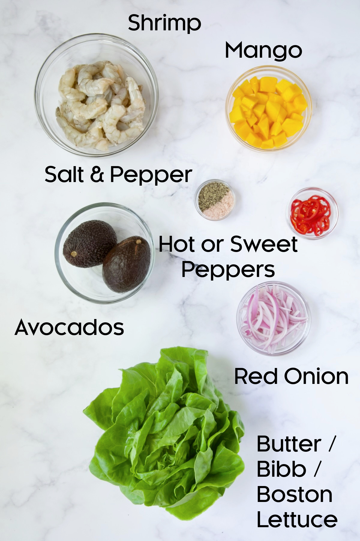 Ingredients for salad in glass bowls.