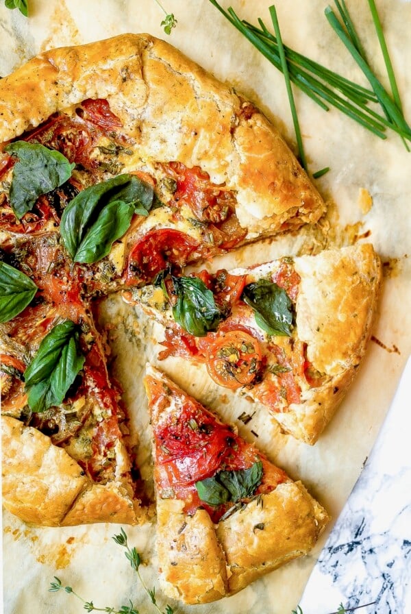 Tomato galette cut into pieces.