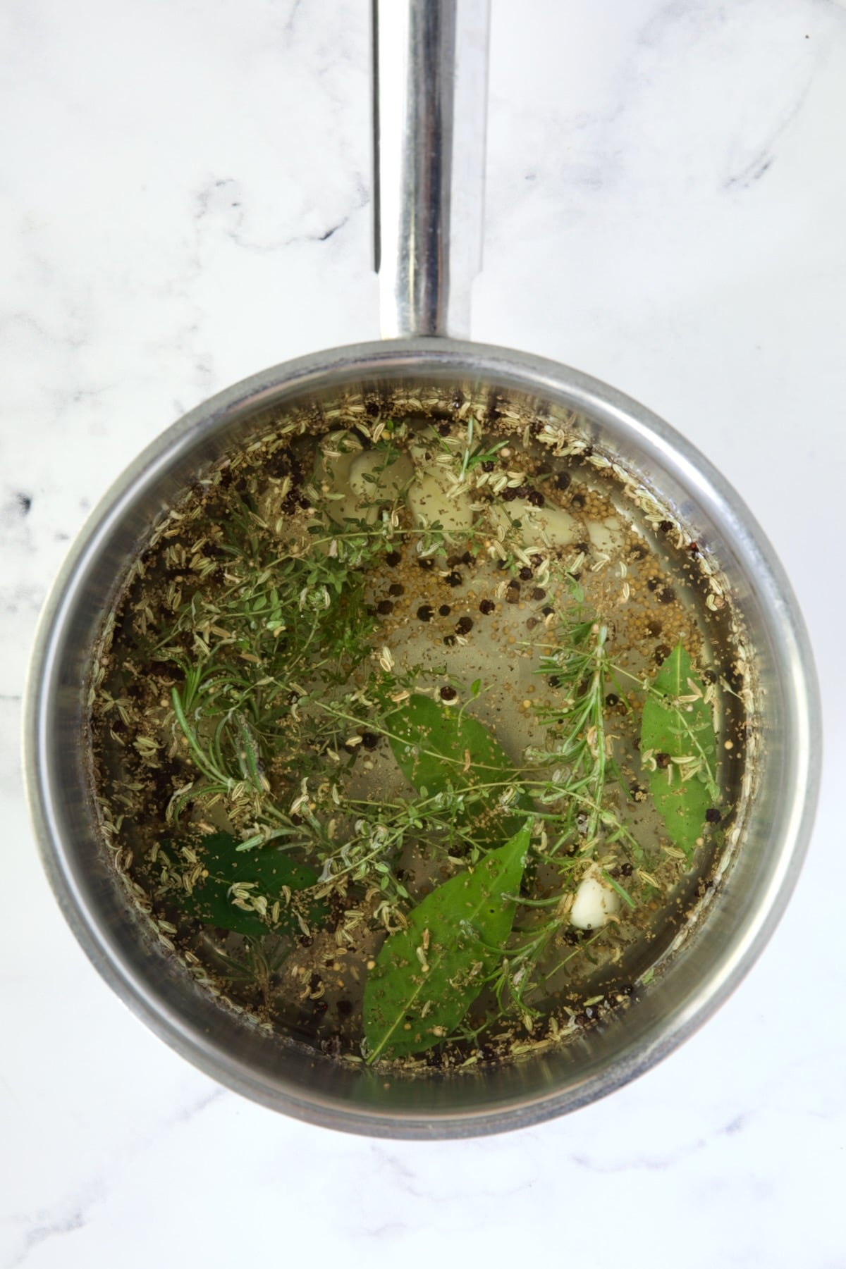Brine in stainless steel saucepan.