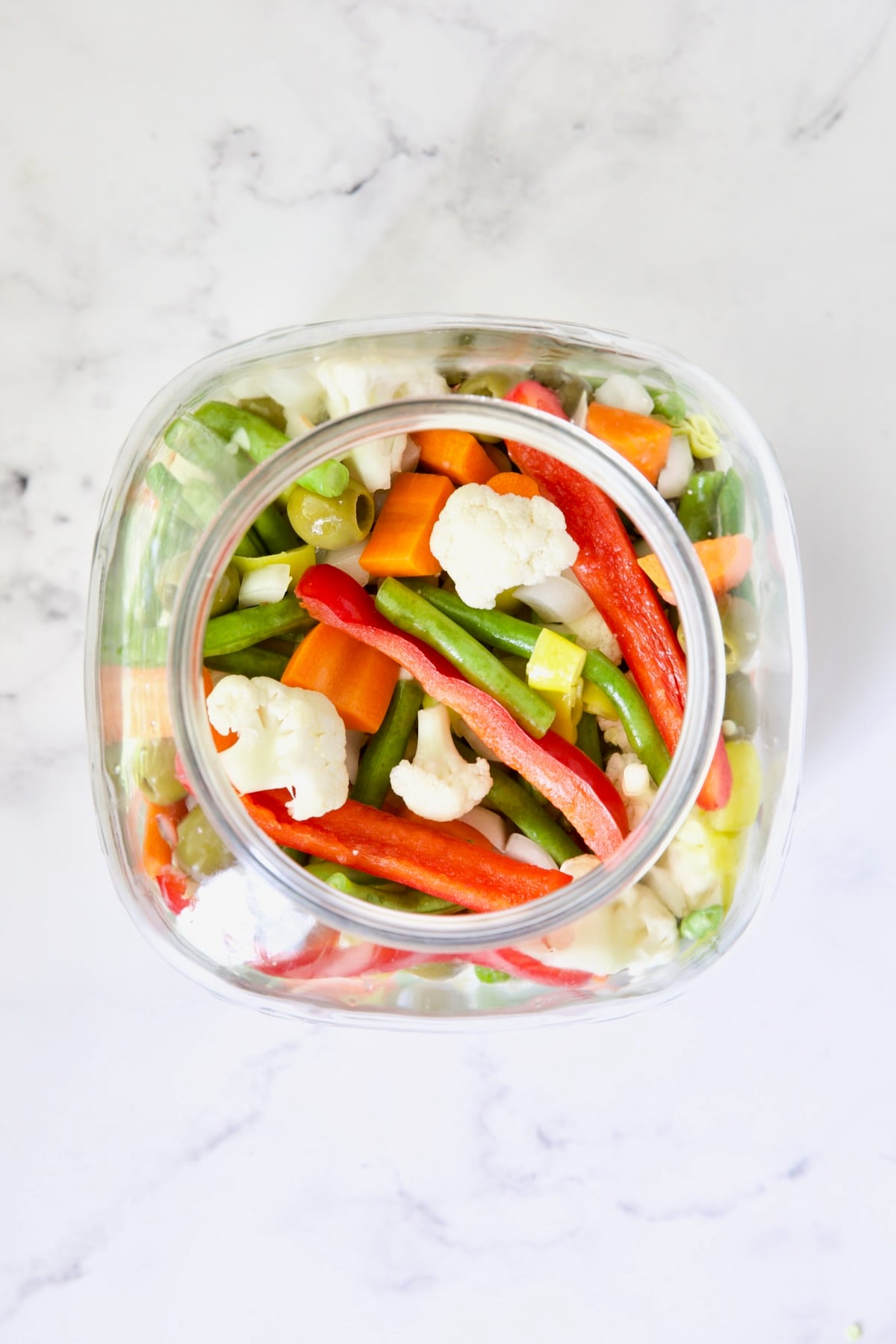 Vegetables for Giardiniera in glass jar.