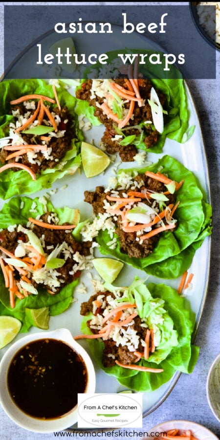 Pinterest graphic for Asian Beef Lettuce Wraps showing them on a gray oval platter with dipping sauce.