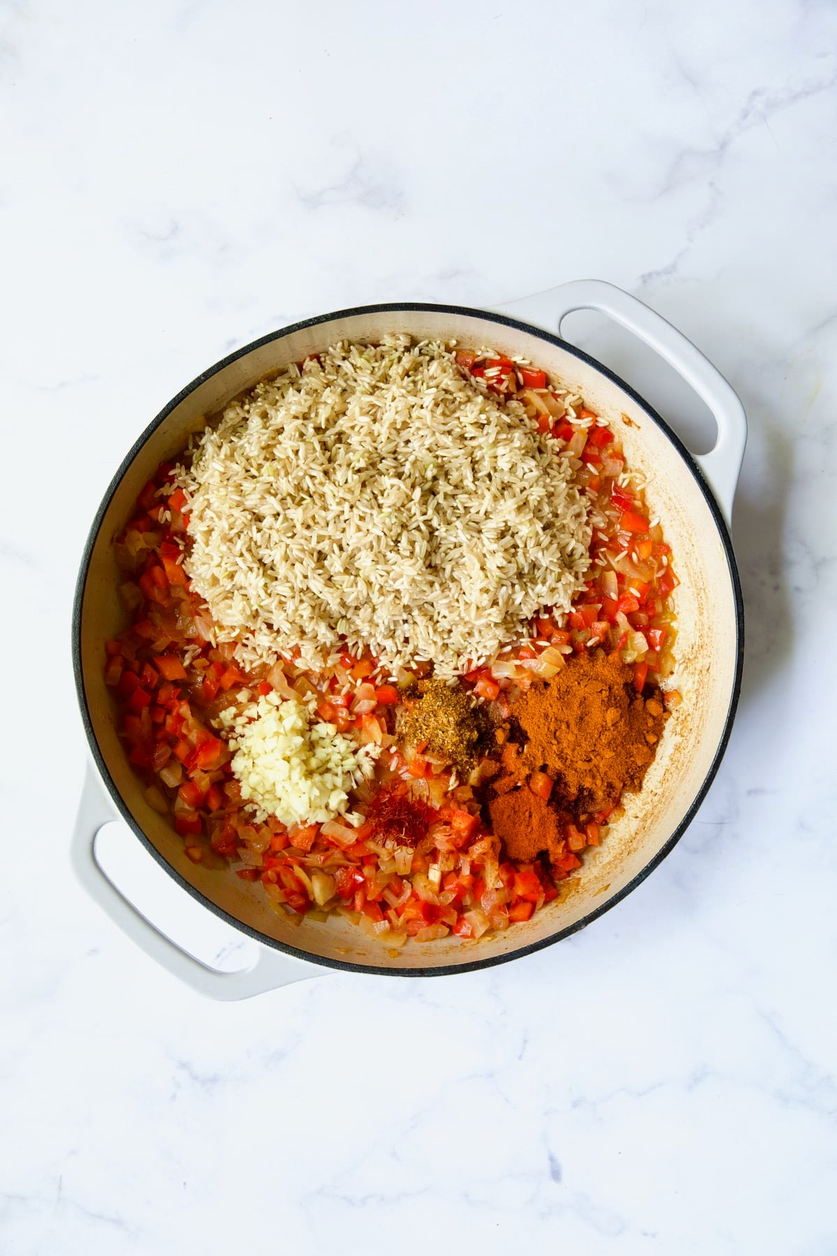 Process shot with brown rice, garlic and spices added.