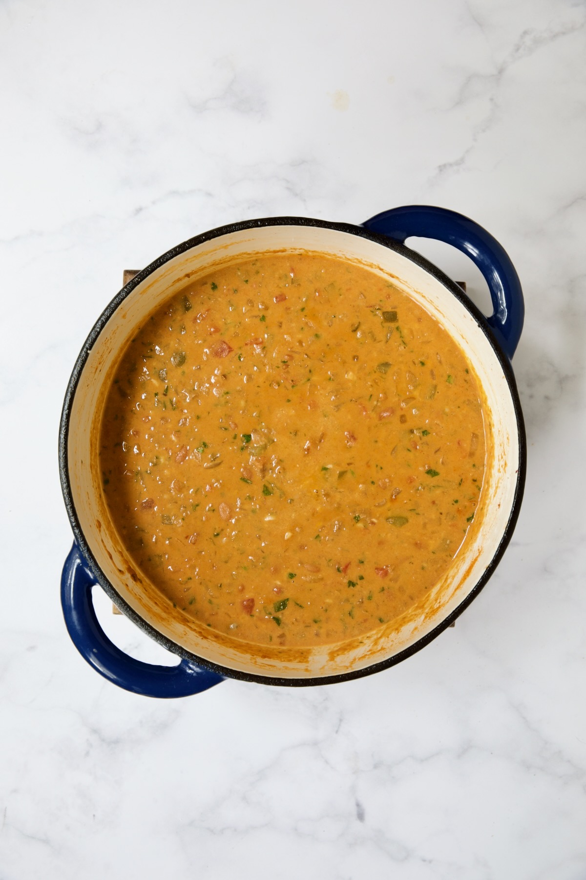 Creamy Taco Soup in blue Dutch oven.