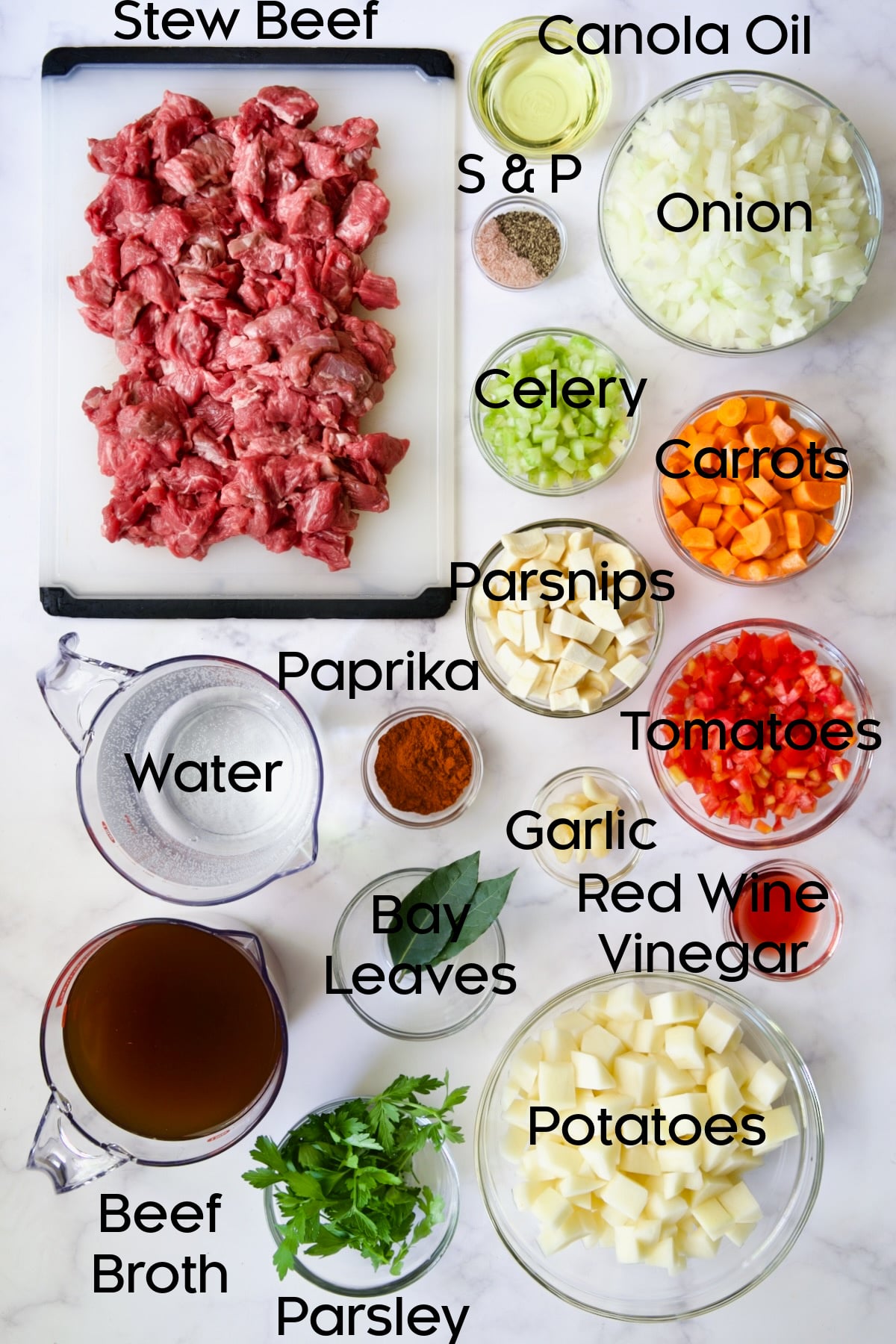 Ingredients for Traditional Hungarian Goulash Soup Recipe in glass bowls.