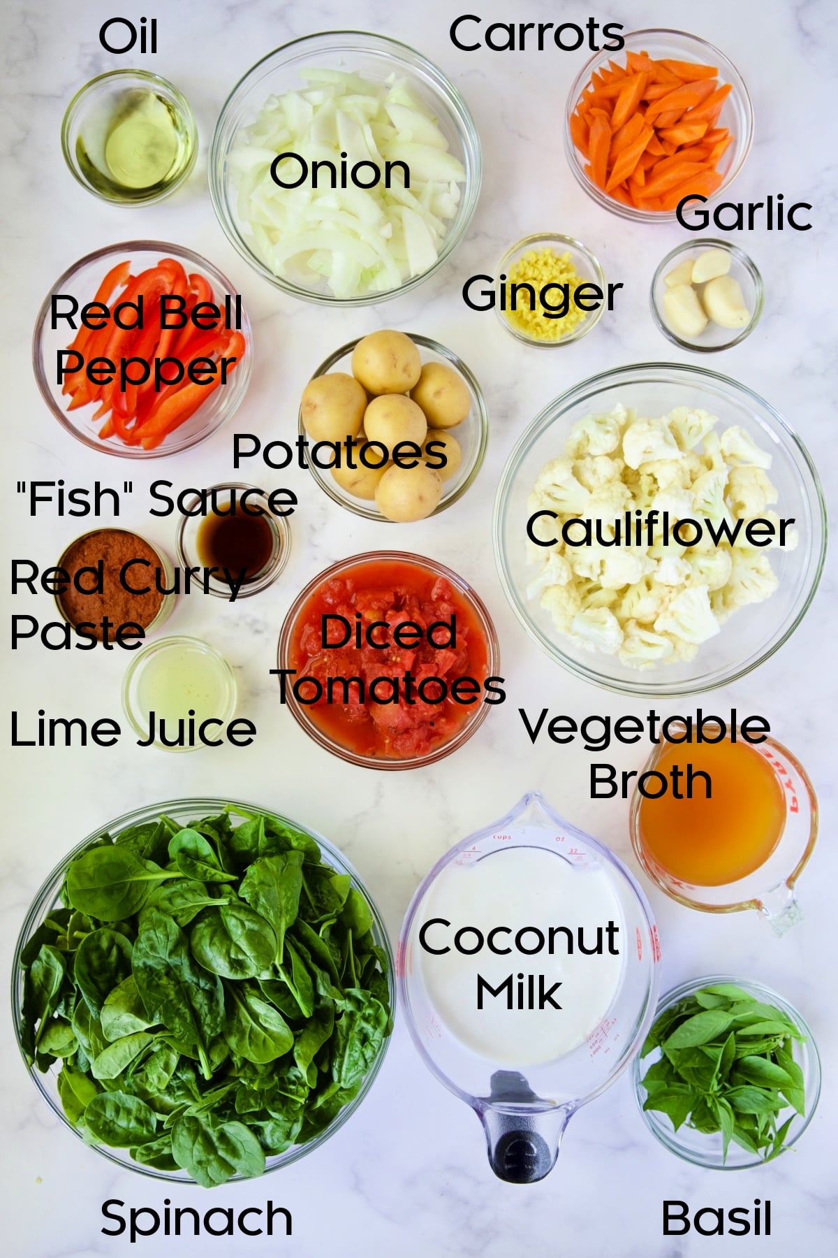 Ingredients for Vegan Thai Red Curry in glass bowls.