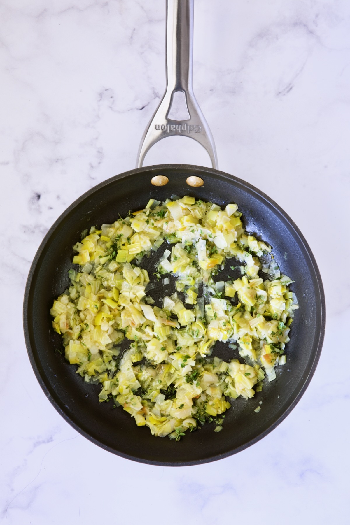 Cooked leeks in nonstick skillet.