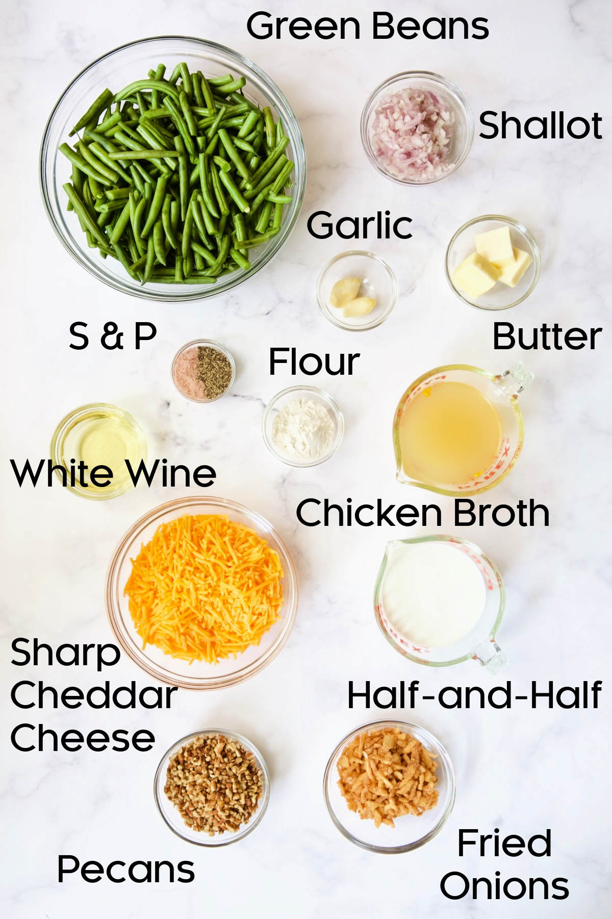 Ingredients for Cheesy Green Bean Casserole in glass bowls.
