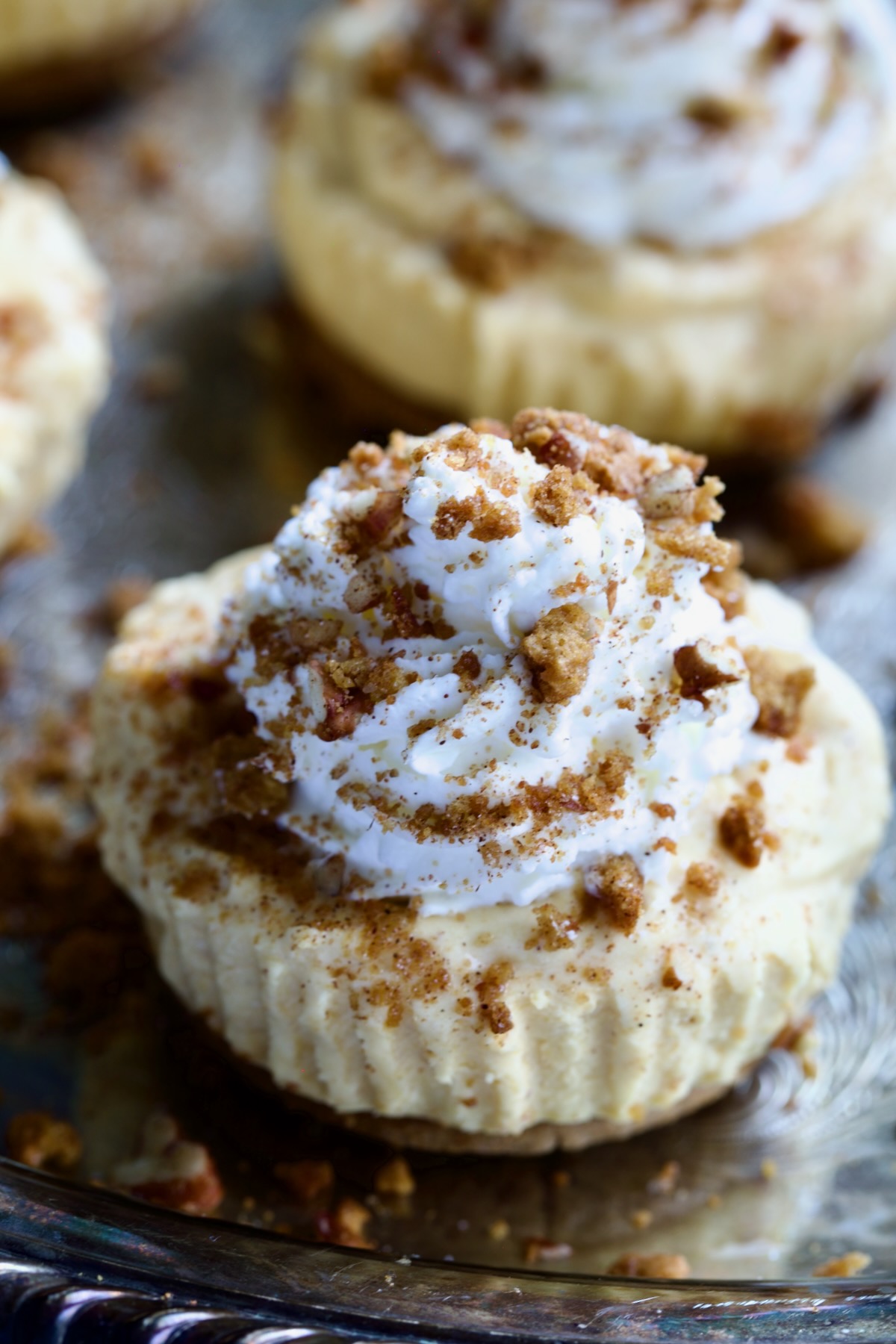 One Easy Mini No-Bake Pumpkin Cheesecake on silver platter.