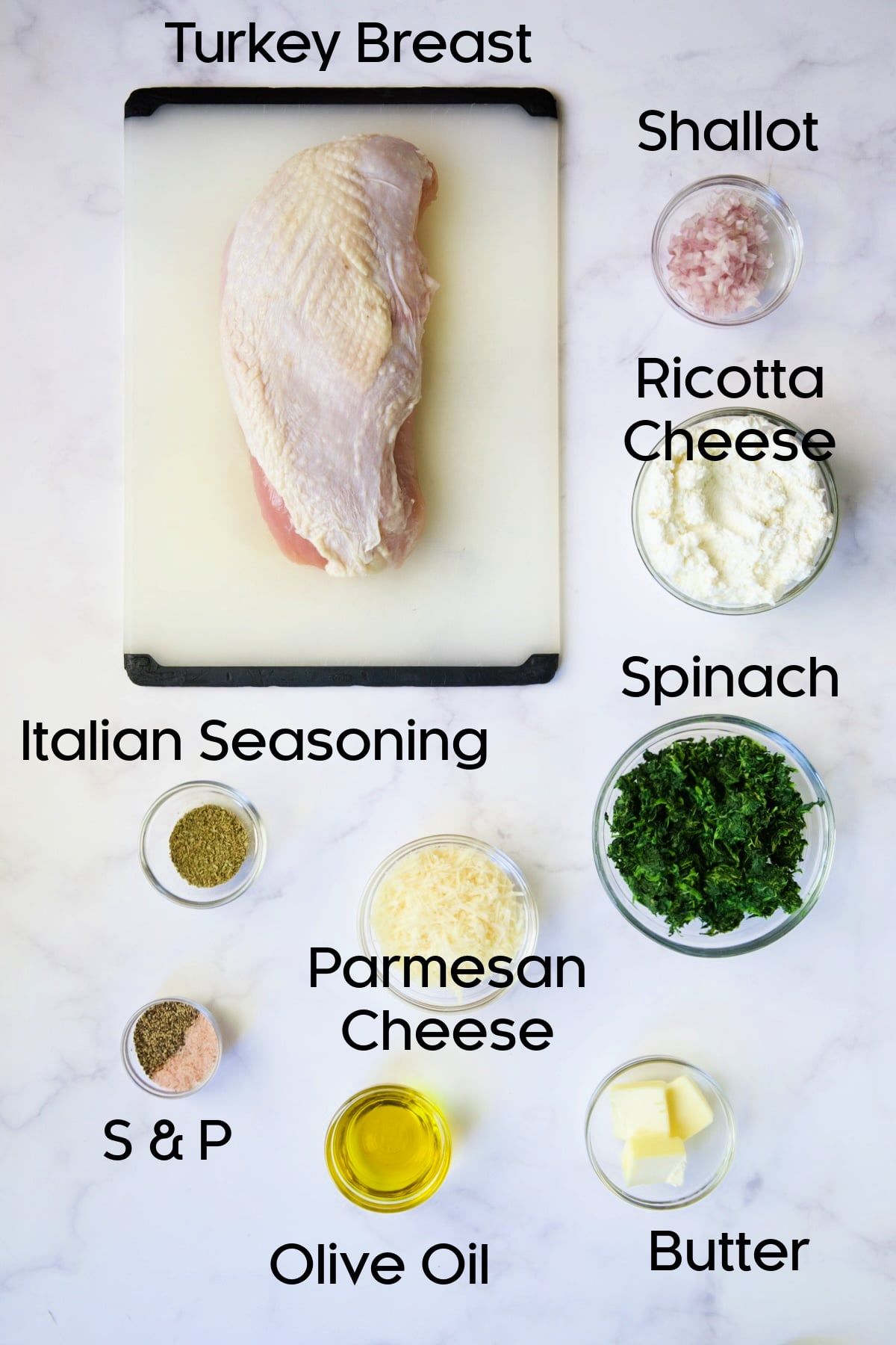 Ingredients for stuffed turkey breast in glass bowls.