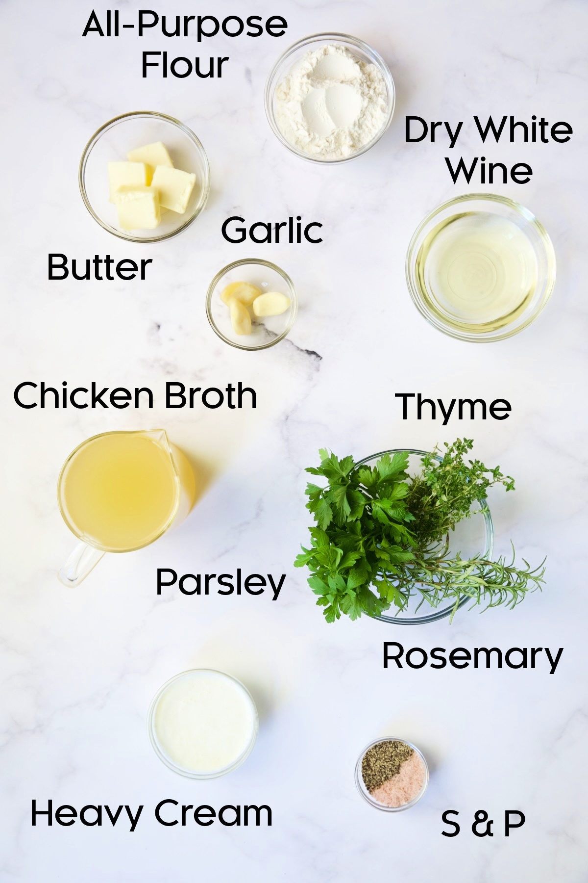 Ingredients for Garlic Herb Sauce in glass bowls.