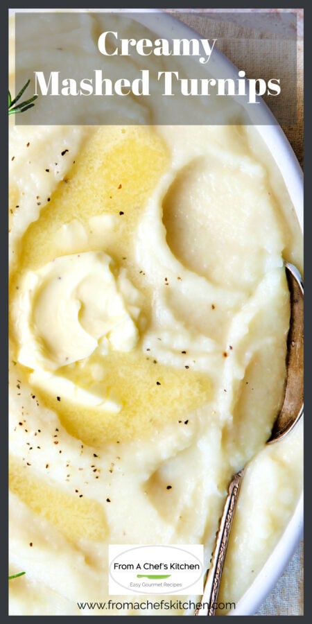 Creamy mashed turnips in oval white bowl topped with butter with serving spoon.