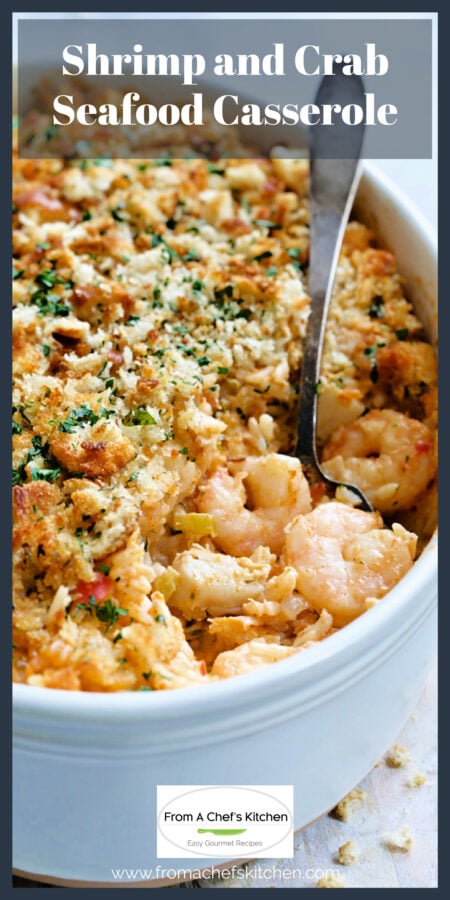 Shrimp and Crab Seafood Casserole in white baking dish with serving spoon scooping some up.
