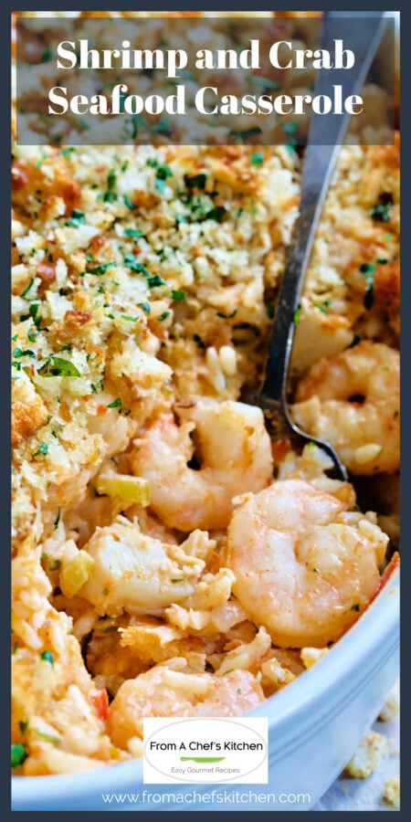Shrimp and Crab Seafood Casserole in white baking dish with serving spoon scooping some up.