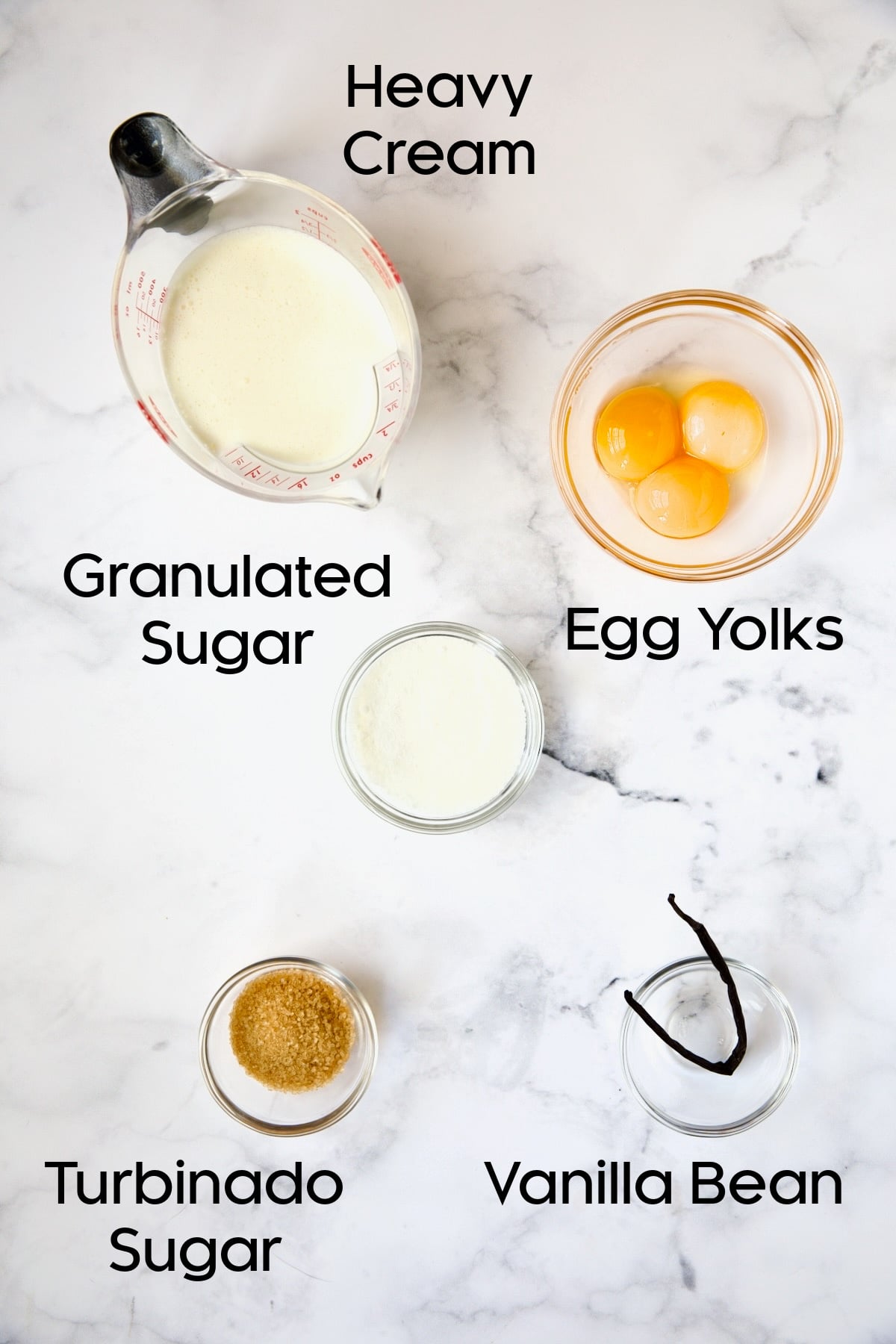 Ingredients for Classic Creme Brulee for Two in glass bowls.