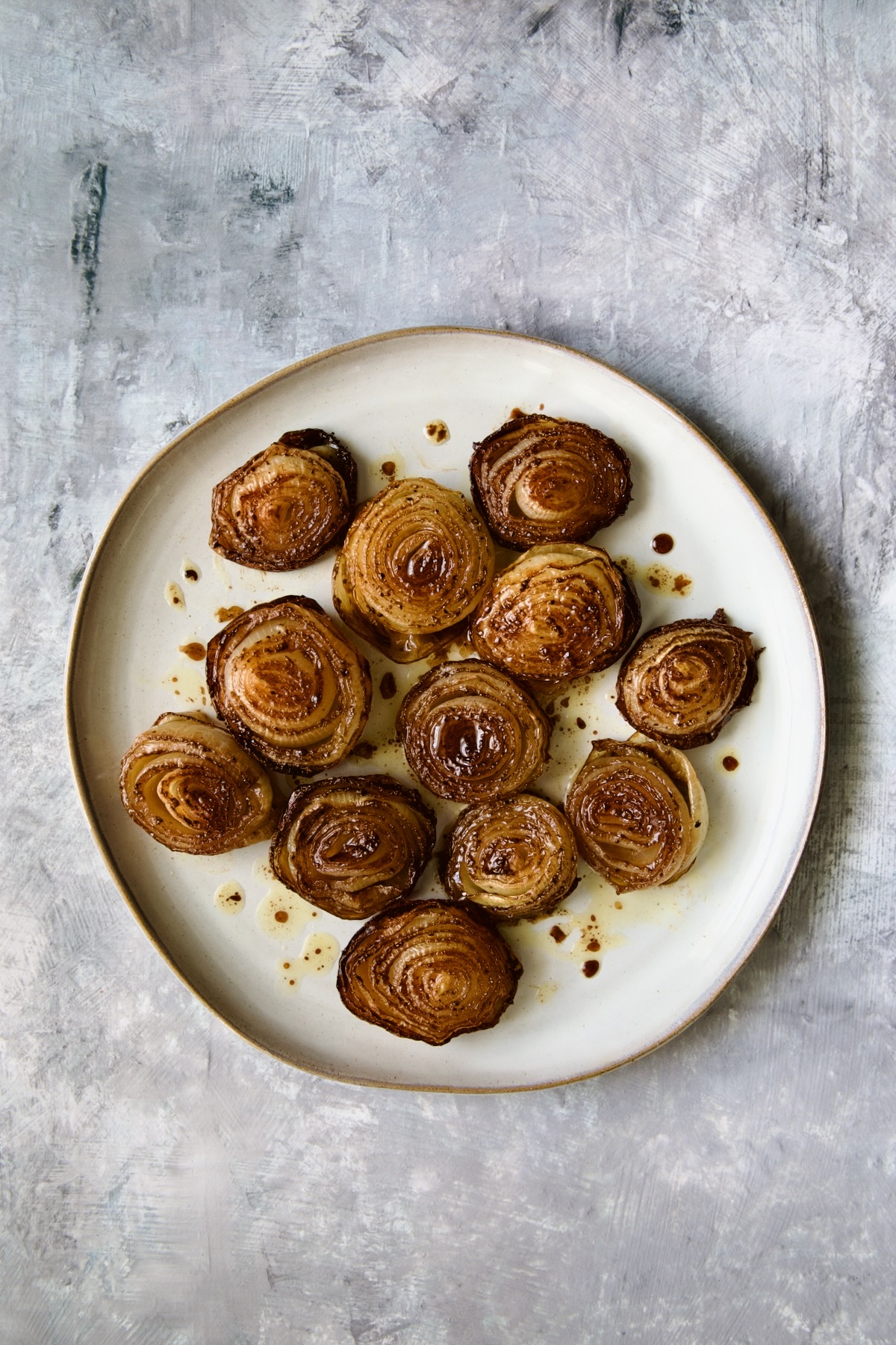 Roasted Onions on round plate.