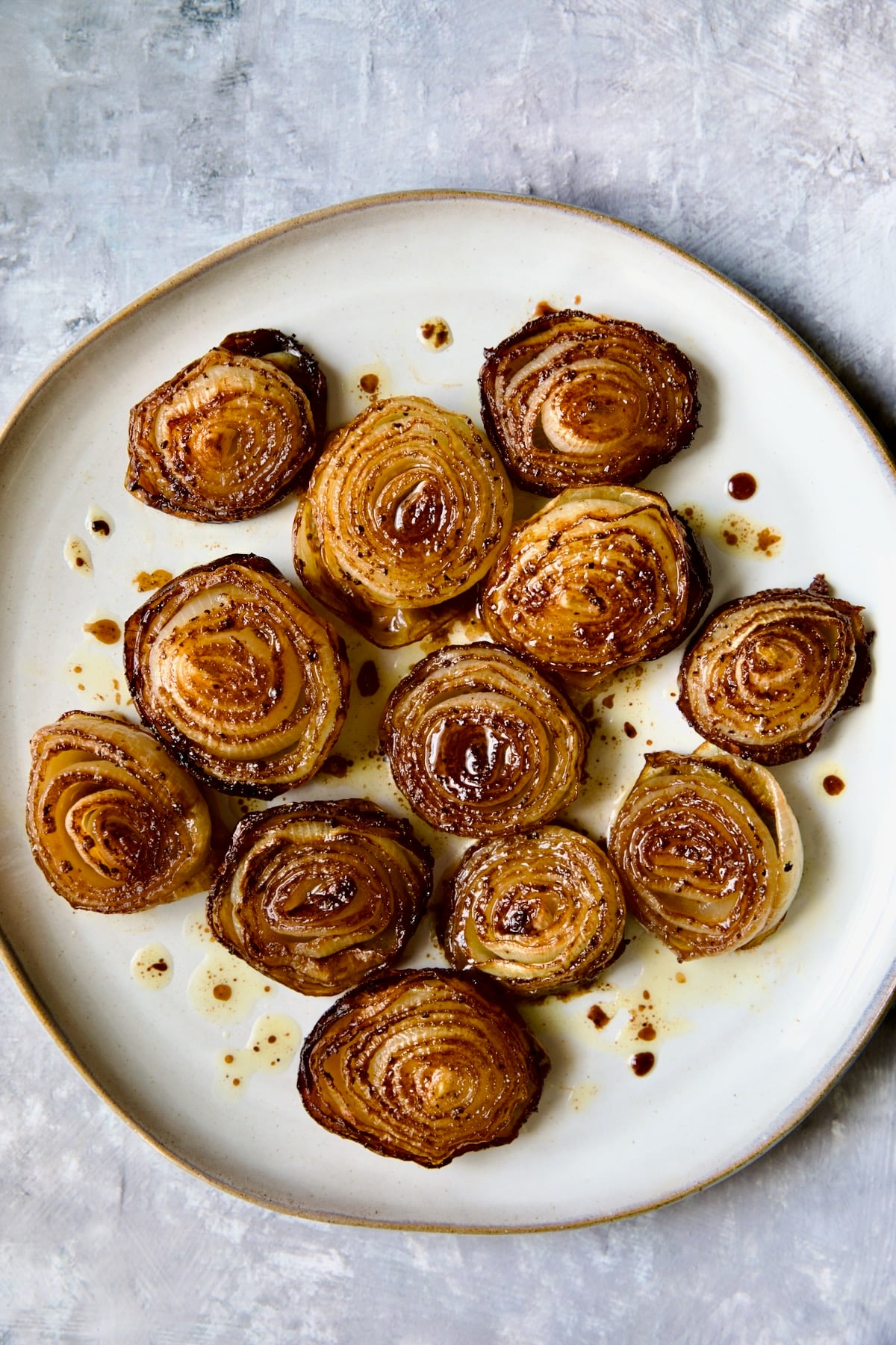 Roasted Onions on round plate.
