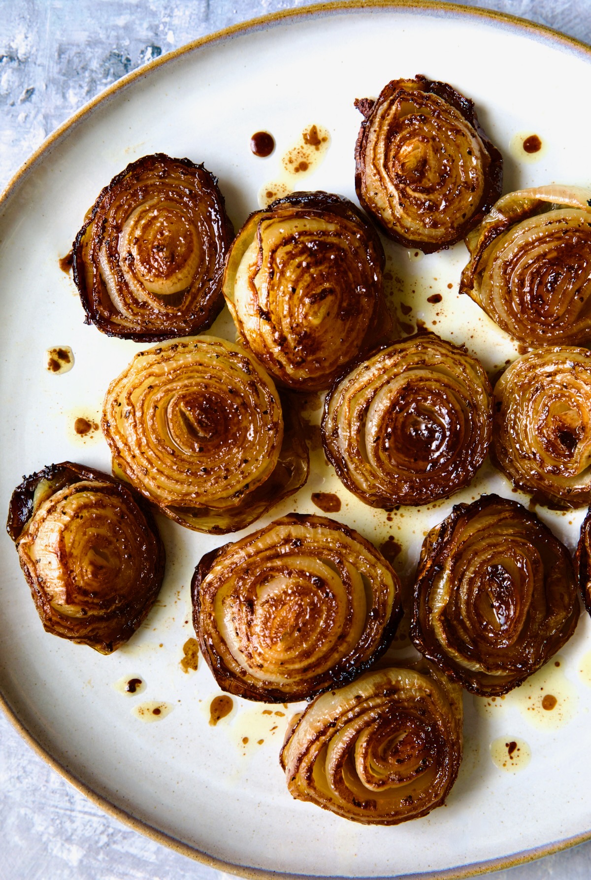 Roasted Onions on round plate.