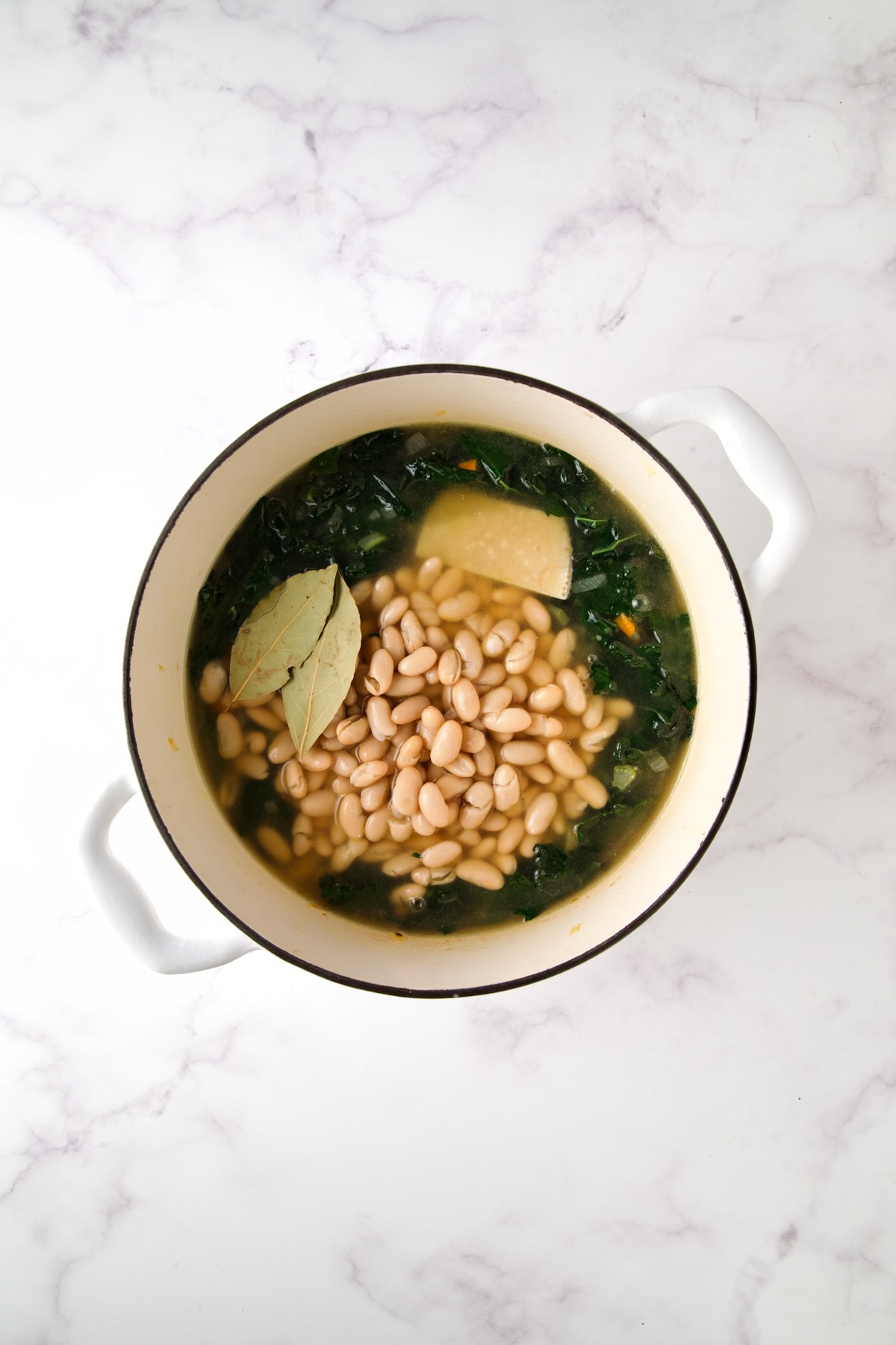 Soup with beans, bay leaves and Parmigiana-Reggiano rinds added.