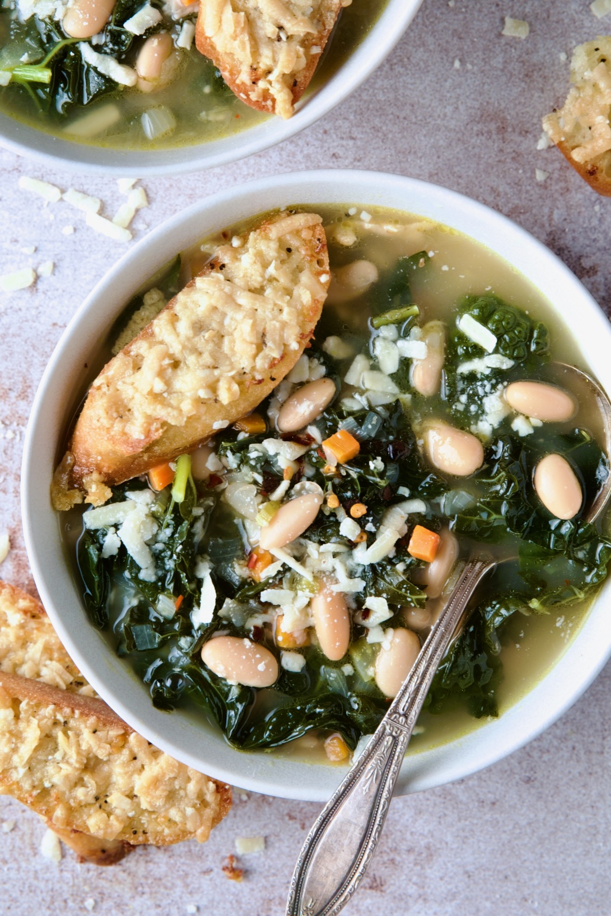 One bowl of White Bean Kale Soup with Parmesan Toast.