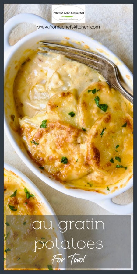 Au gratin potatoes in individual oval baking dish.
