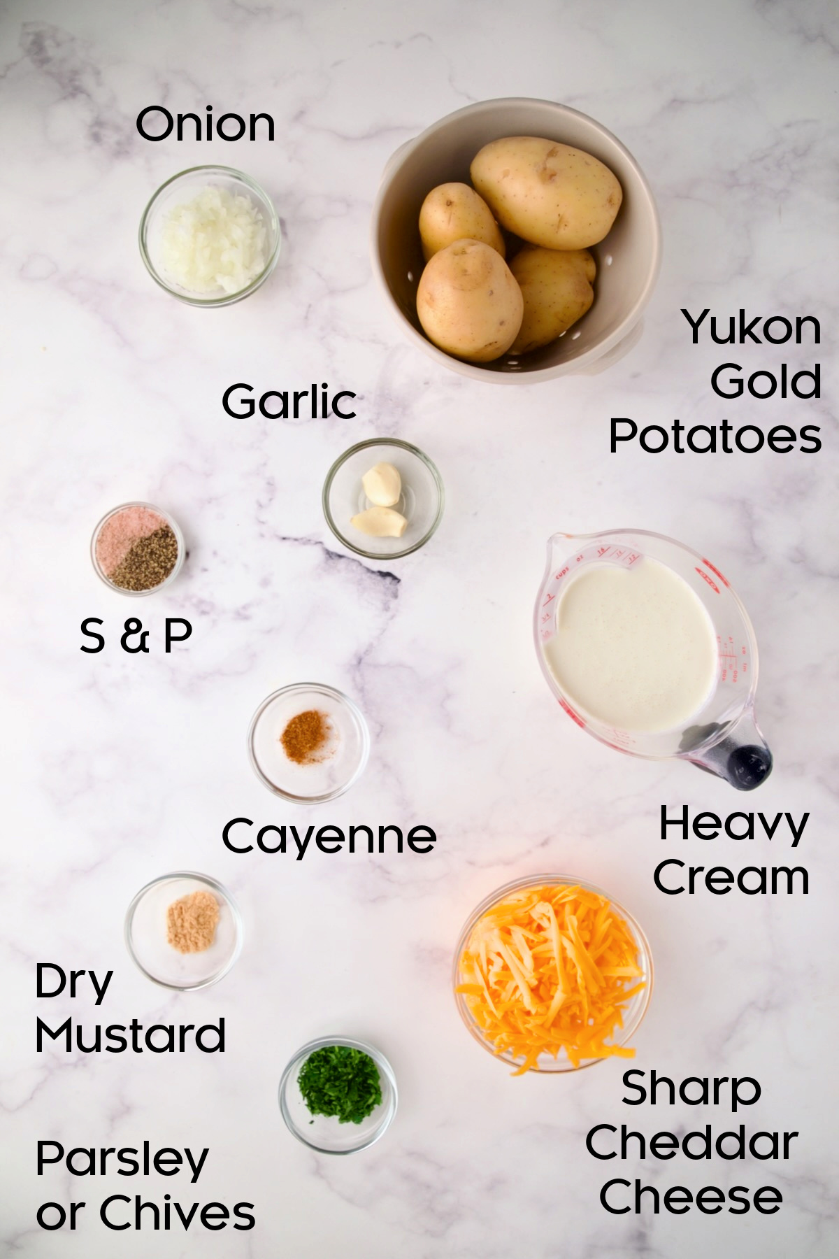 Ingredients for Au Gratin Potatoes for Two in glass bowls.