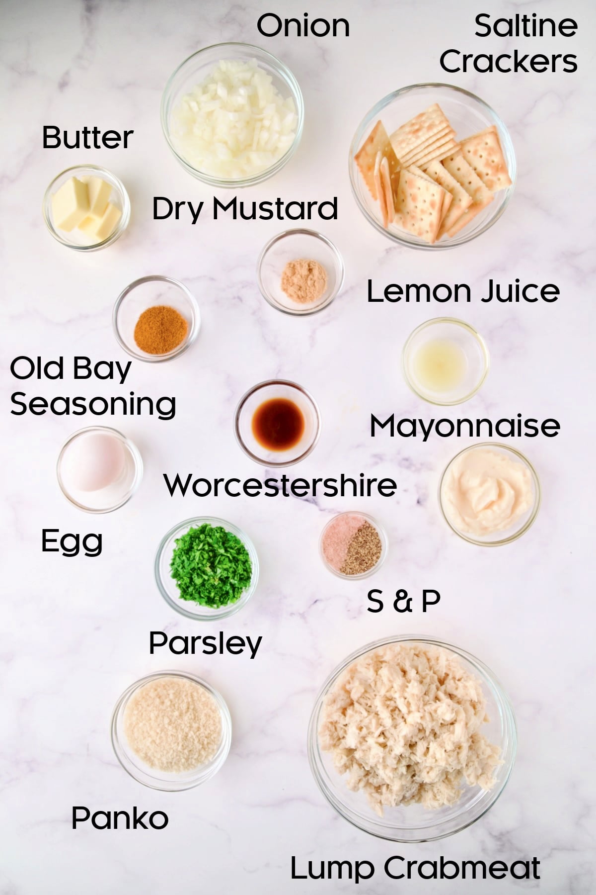 Ingredients for Maryland-Style Crab Cakes in glass bowls.