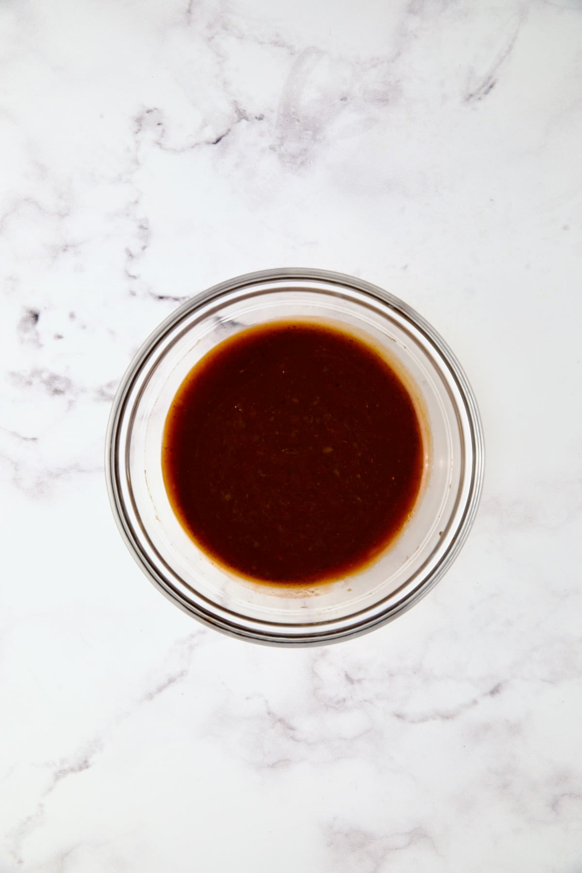 Barbecue sauce in glass bowl.