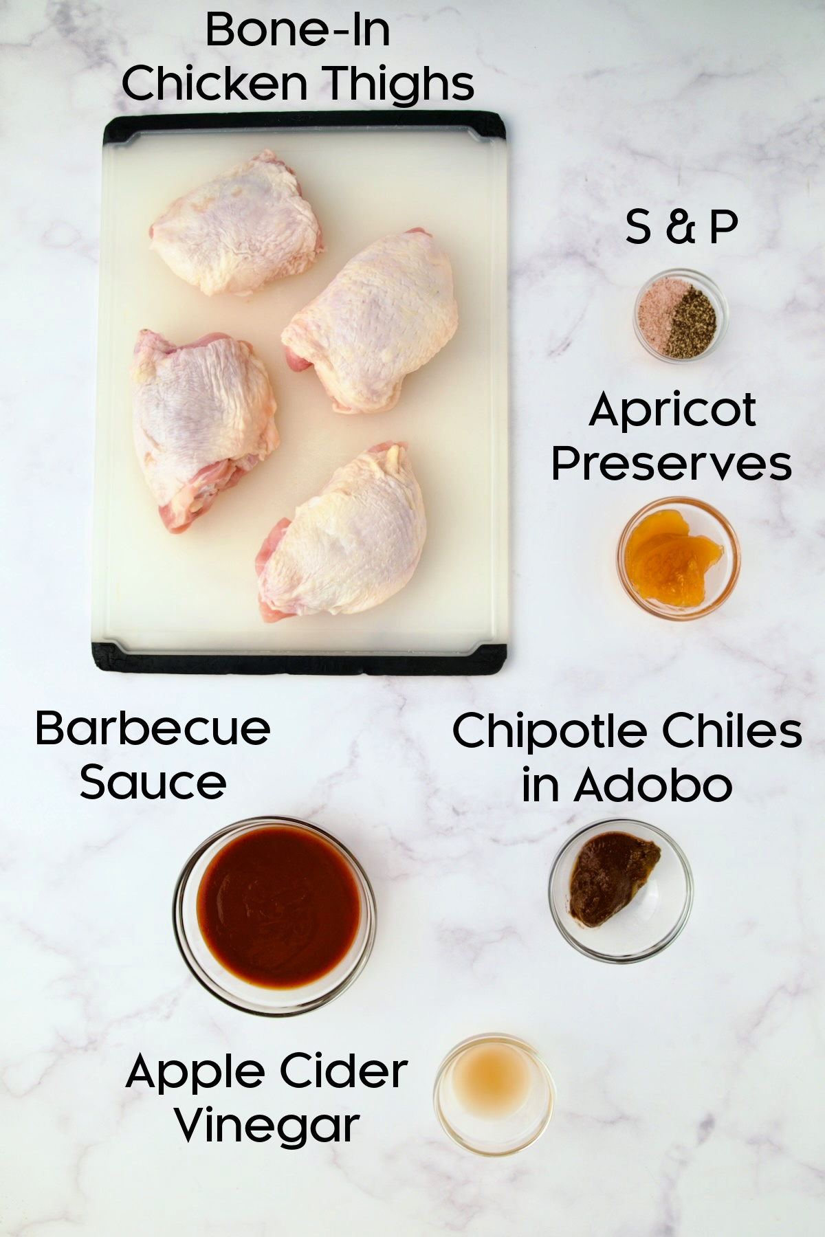 Ingredients for Baked BBQ Chicken Thighs in glass bowls.