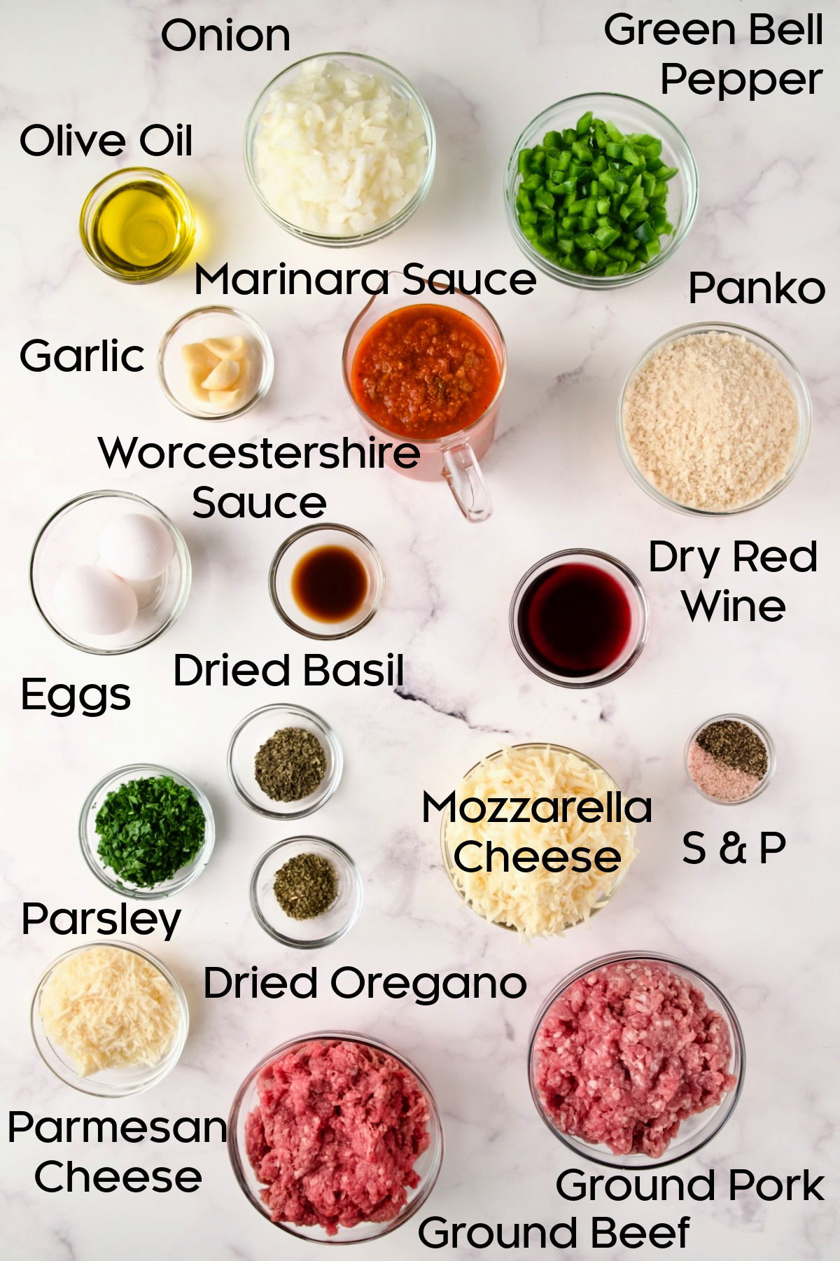 Ingredients for Italian Meatloaf in glass bowls.