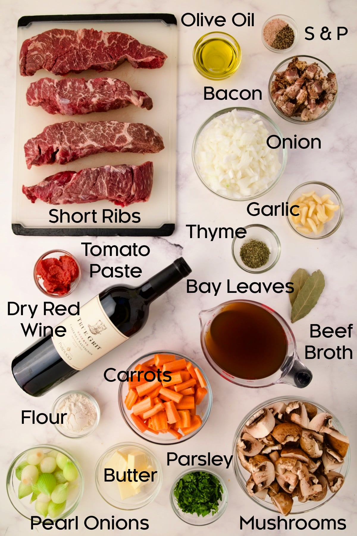 Ingredients for Short Ribs Bourguignon in glass bowls.