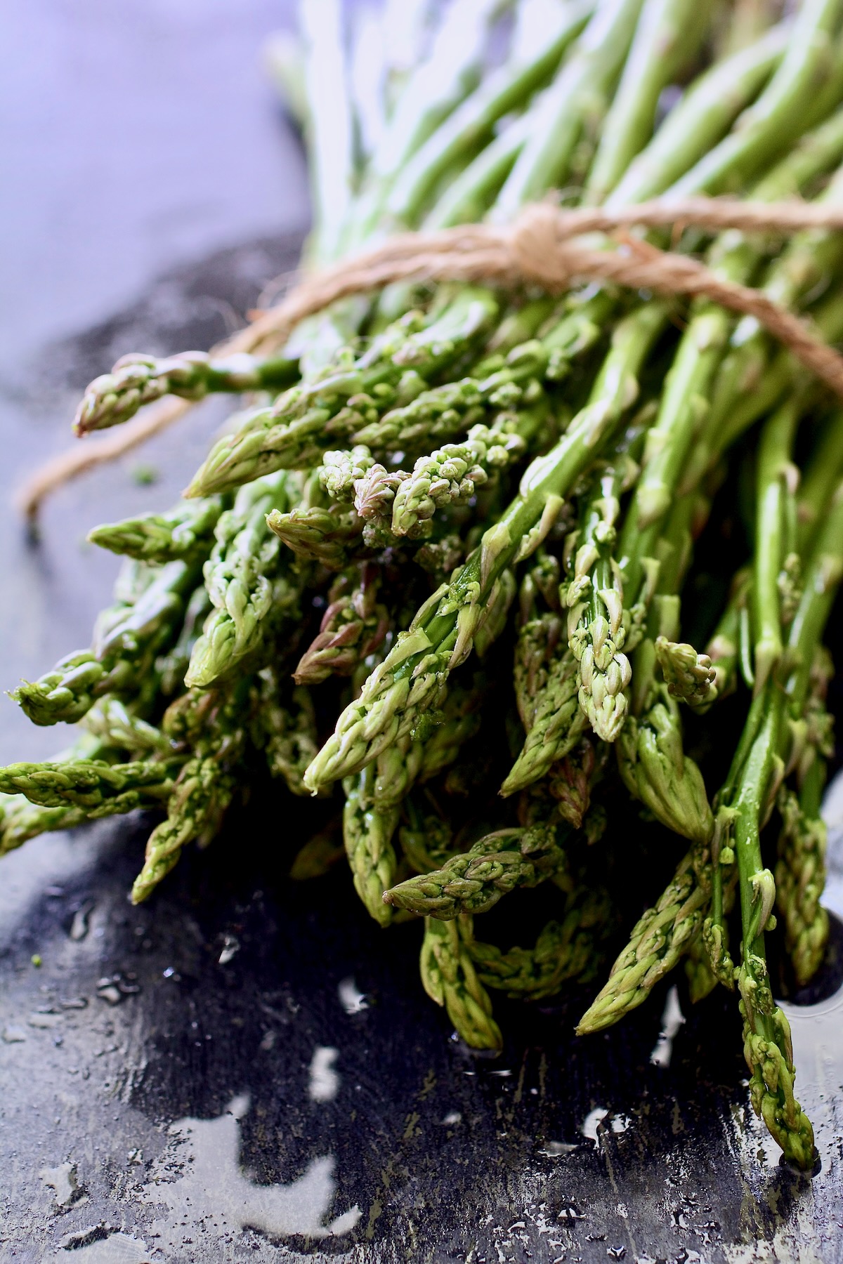 Bunch of asparagus tied with twine.
