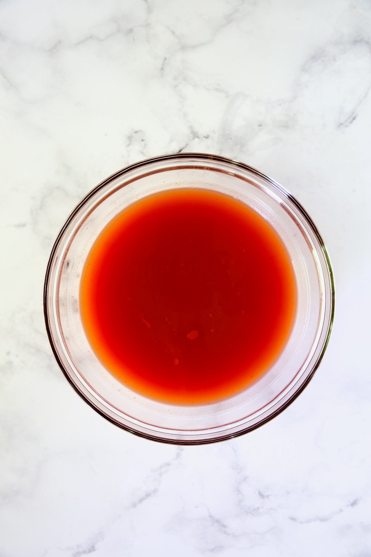 Cocktail sauce in glass bowl.