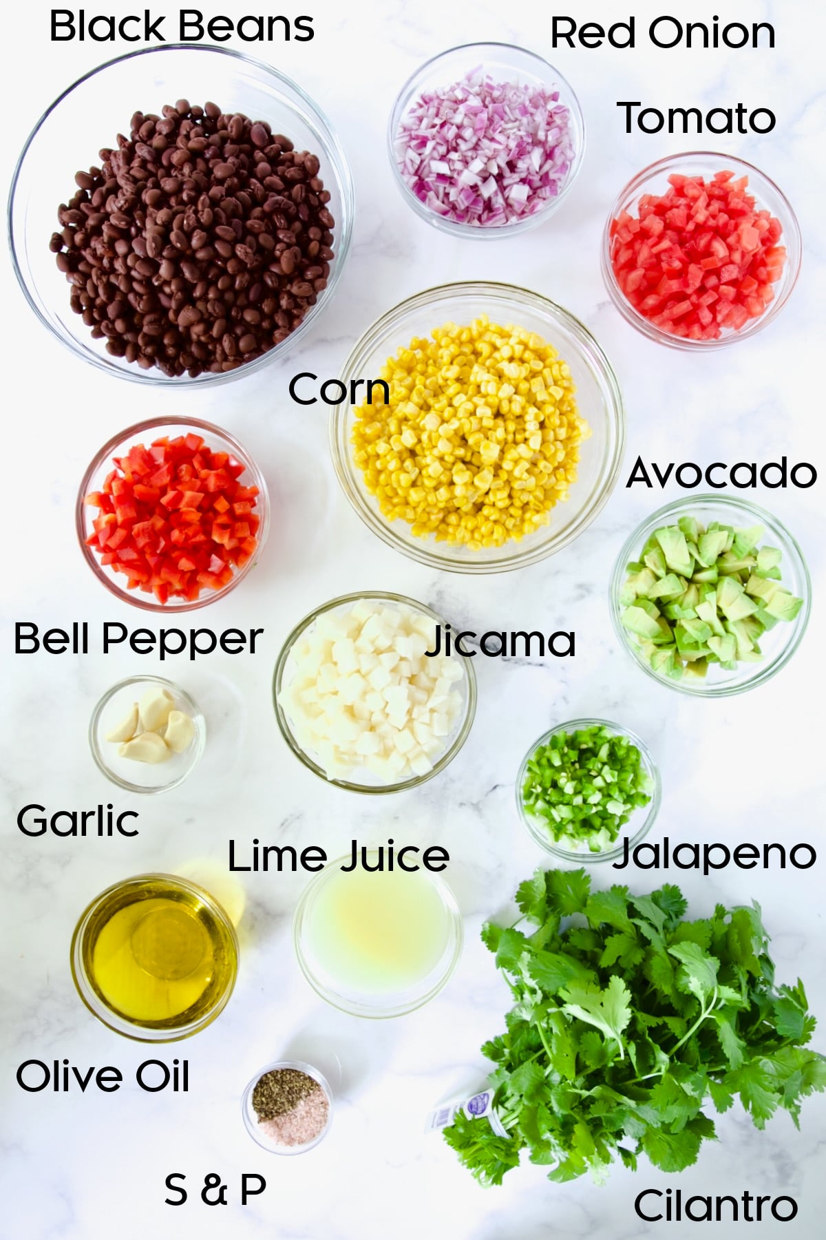 Ingredients for Southwestern Salad in glass bowls.